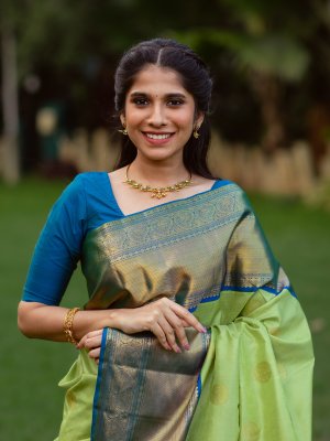 Blue hand woven Blended Cotton saree with Green border