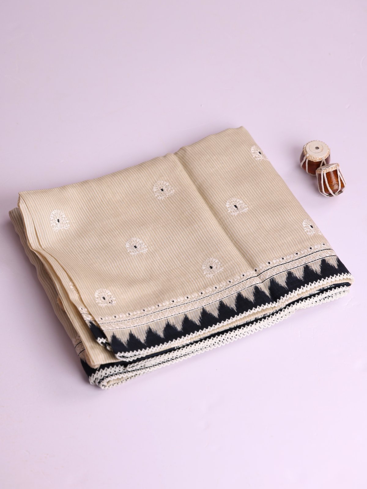 Beige And Cream Striped Munga Tussar Silk Saree With Black Border