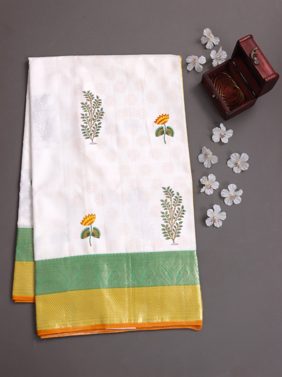 White Block Printed Kanjeevaram Silk Saree With Green & Yellow Zari Border