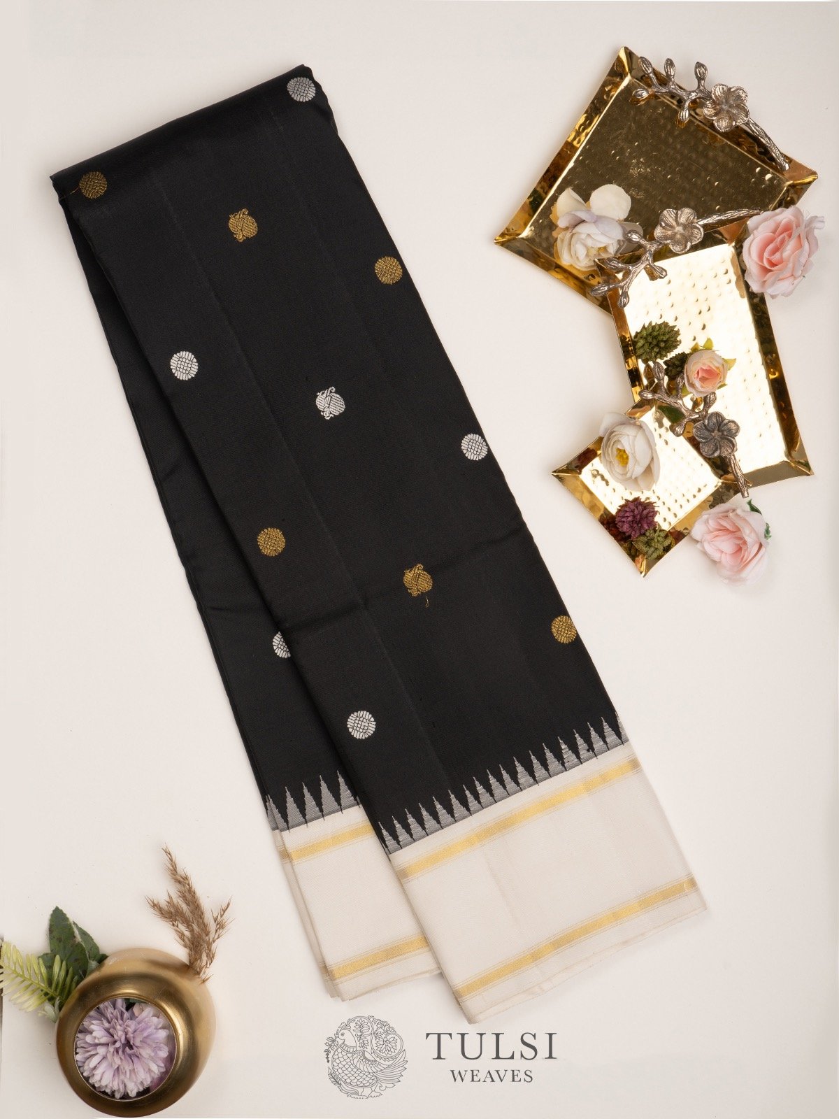 Black Kanjeevaram silk saree with Korvai border