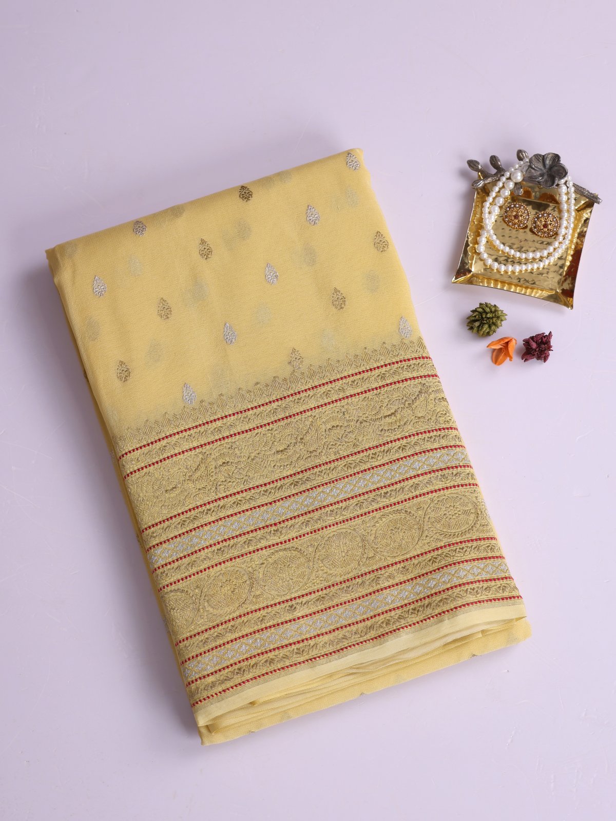 Pastel Yellow Georgette Silk Saree With Zari Border