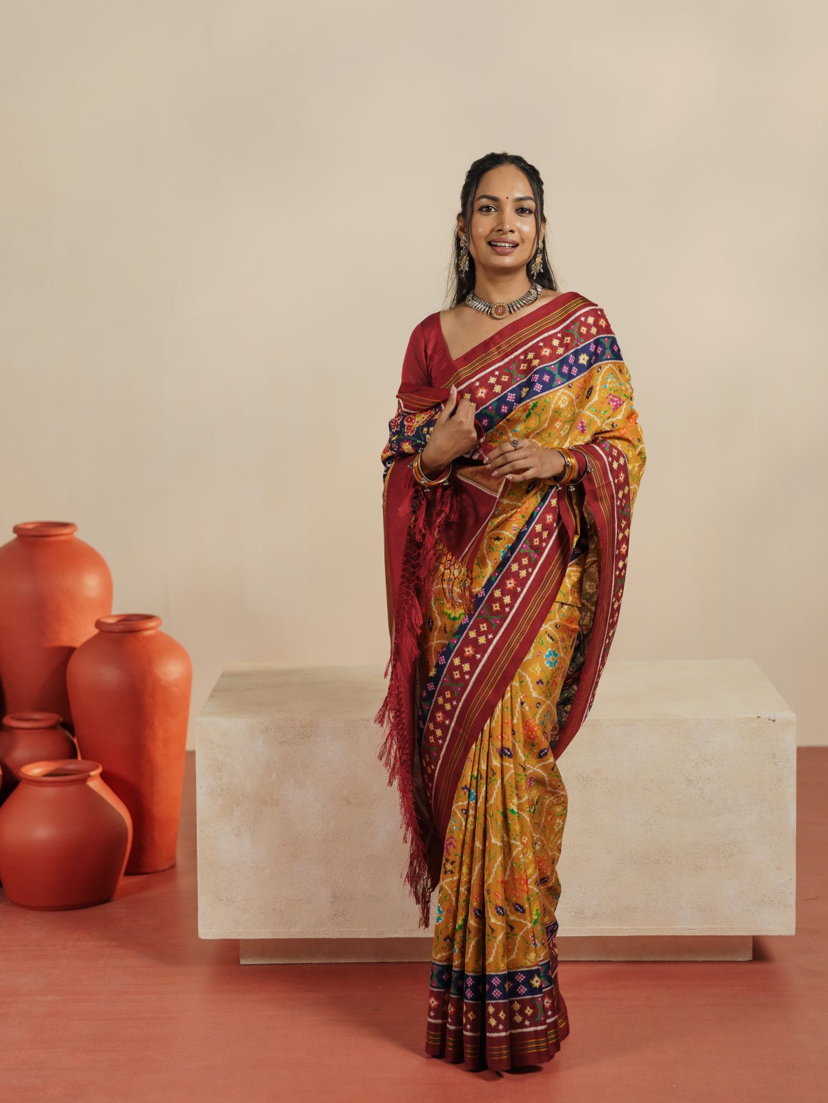 Curated 11 - Mustard Yellow Patan Patola Silk Saree With Dark Red Border