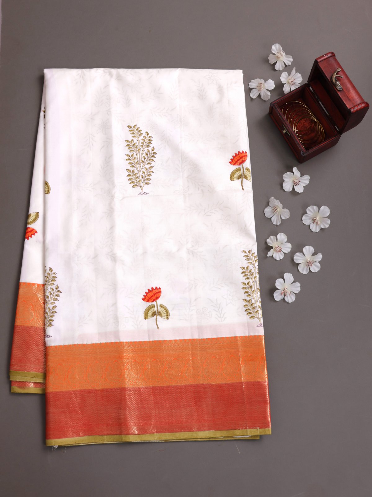 White Block Printed Kanjeevaram Silk Saree With Orange & Red Zari Border