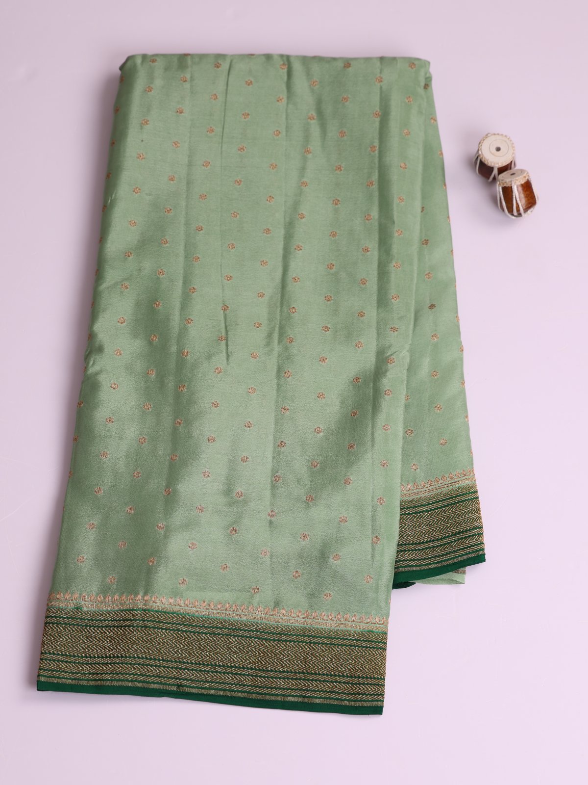 Pastel Green Banaras Crepe Silk Saree With Bottle Green Border