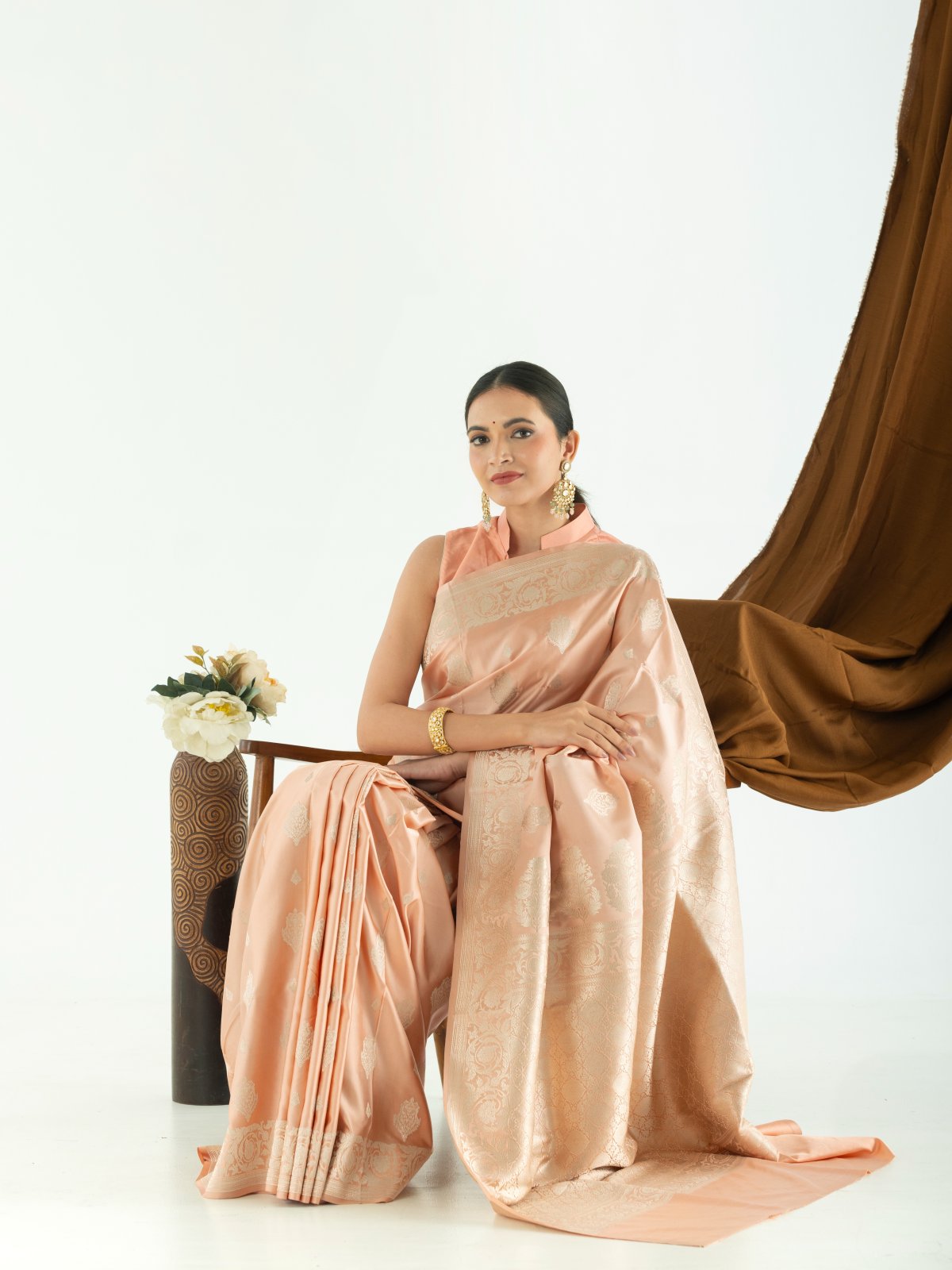 Light Peach Mashru Silk Saree with Self Zari Border