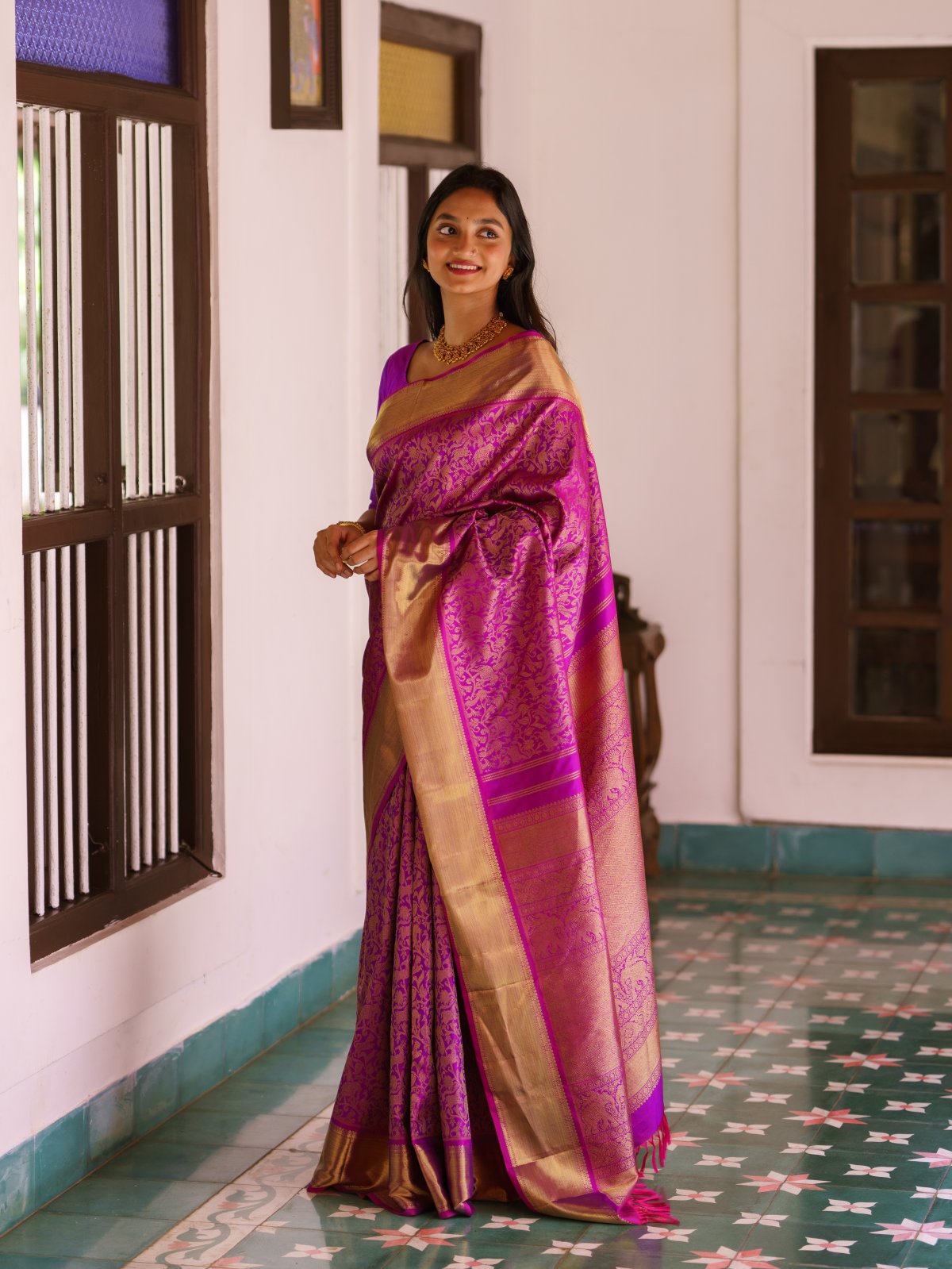 Pinkish Purple Kanjeevaram Silk Saree with Self Zari Border