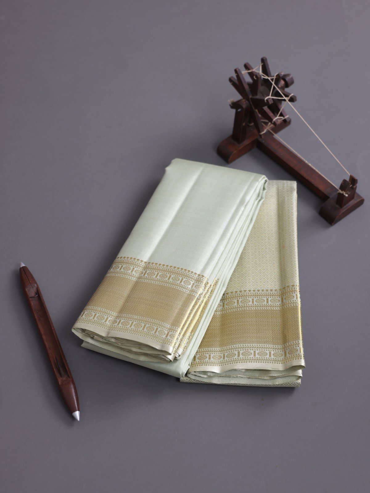 Pastel Green Silk Dhoti And Zari Brocade Vasthram With Zari Border