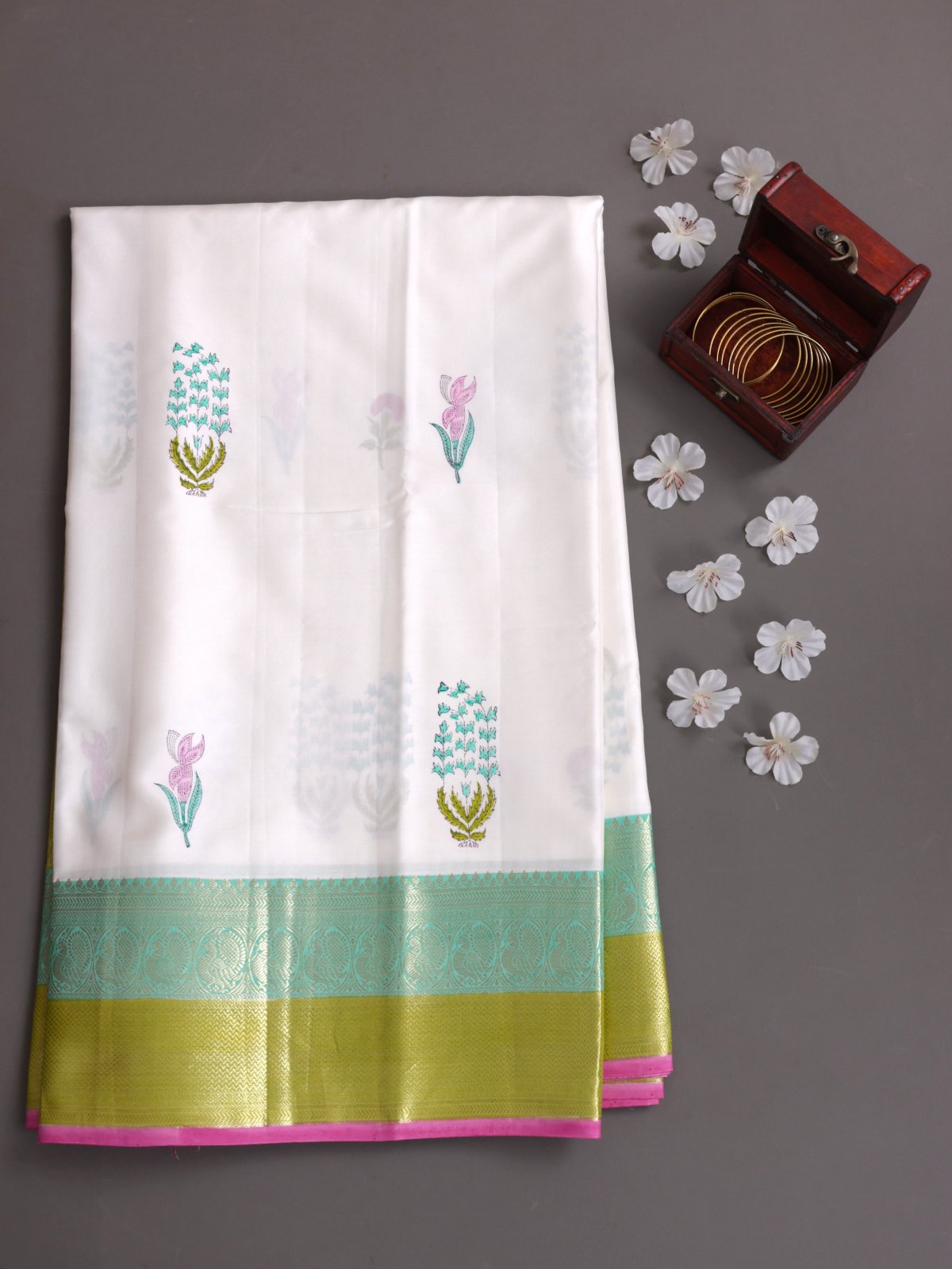 White Block Printed Kanjeevaram Silk Saree With Teal & Mehndi Green Zari Border