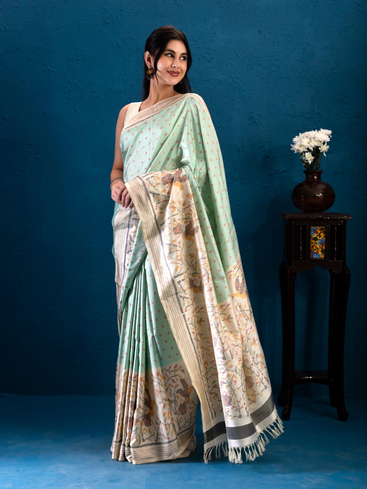 Light Green Patola Silk Saree with Off-white Border