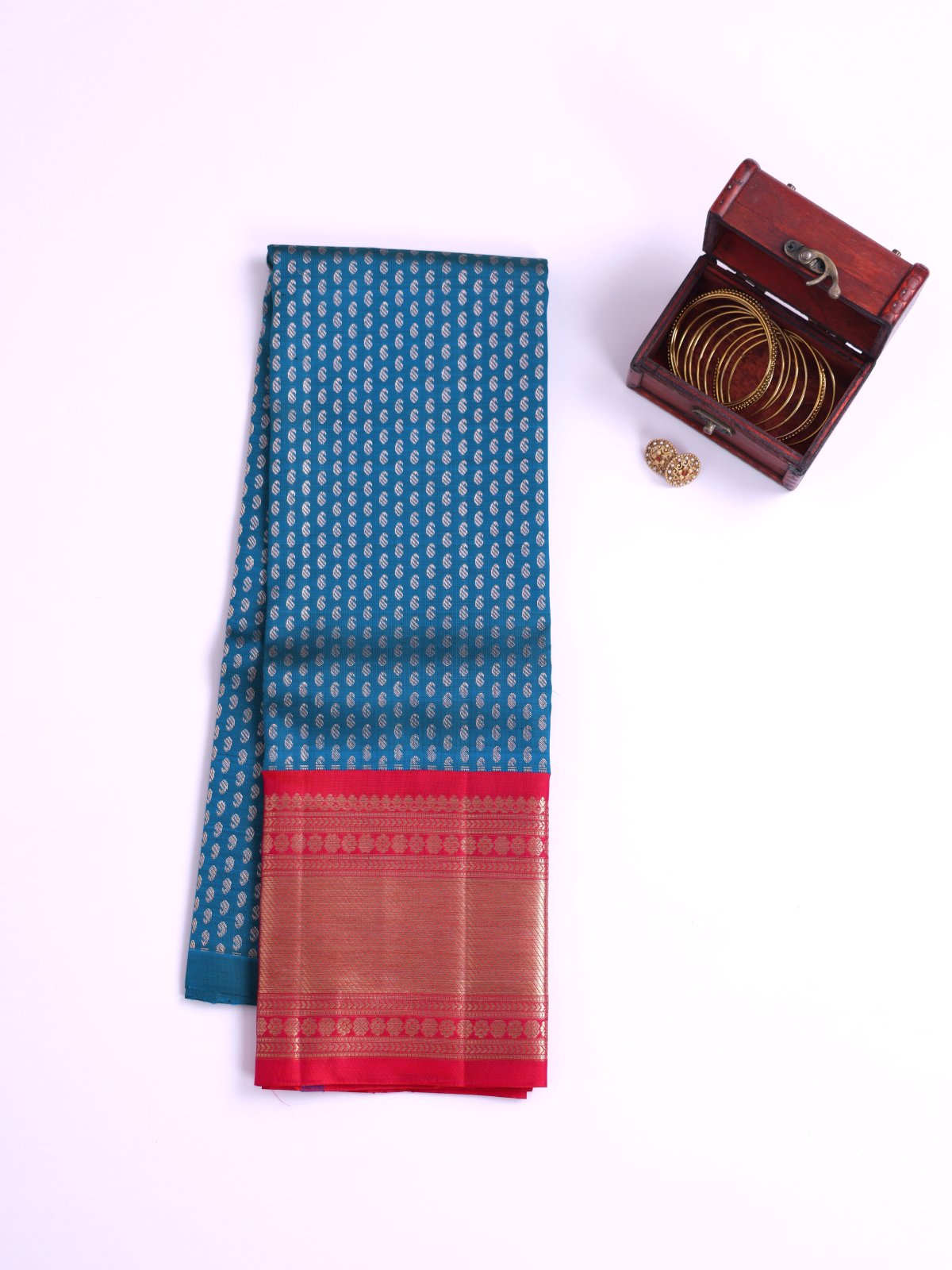 Peacock Blue Kanjeevaram Silk Pavadai With Pinkish Red Border