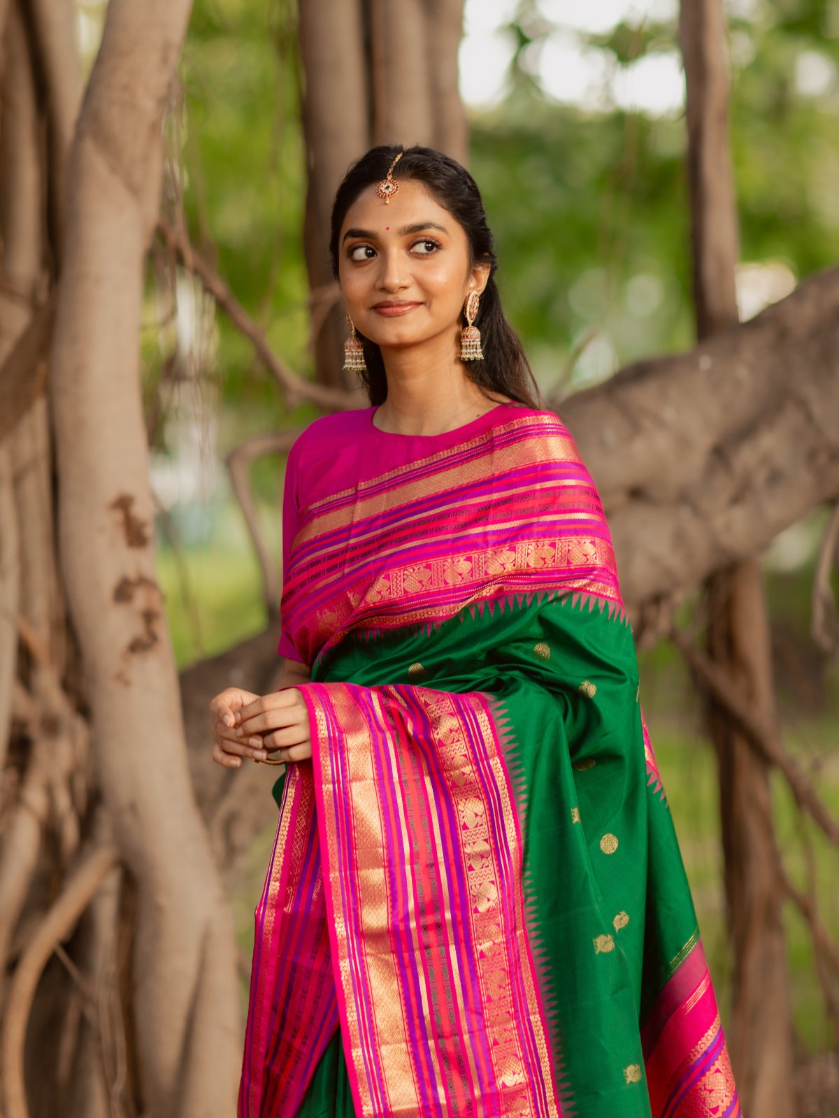 Green Kanjeevaram Silk Saree With Pink Border