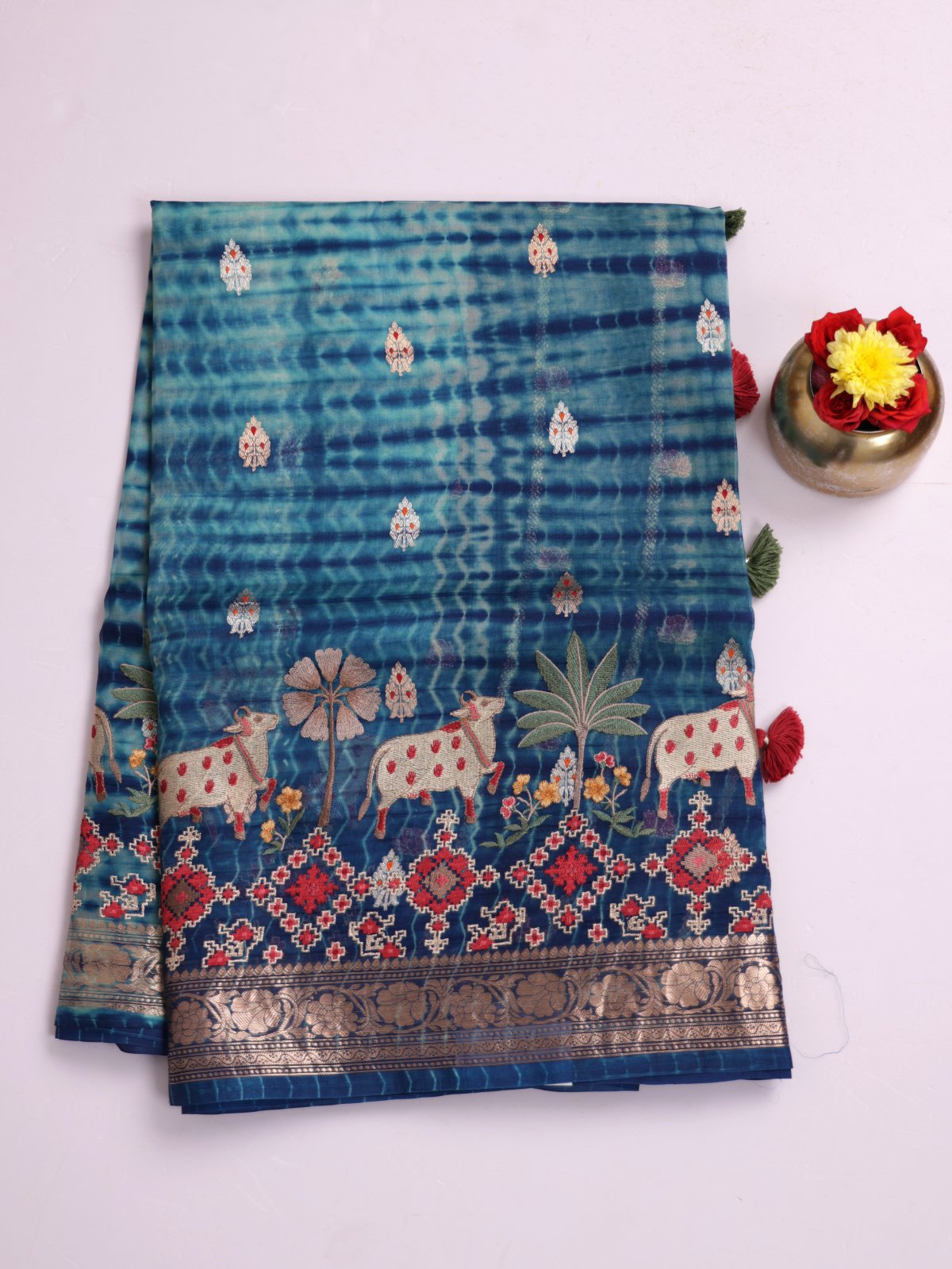 Peacock Blue Organza Silk Saree With Embroidered Border