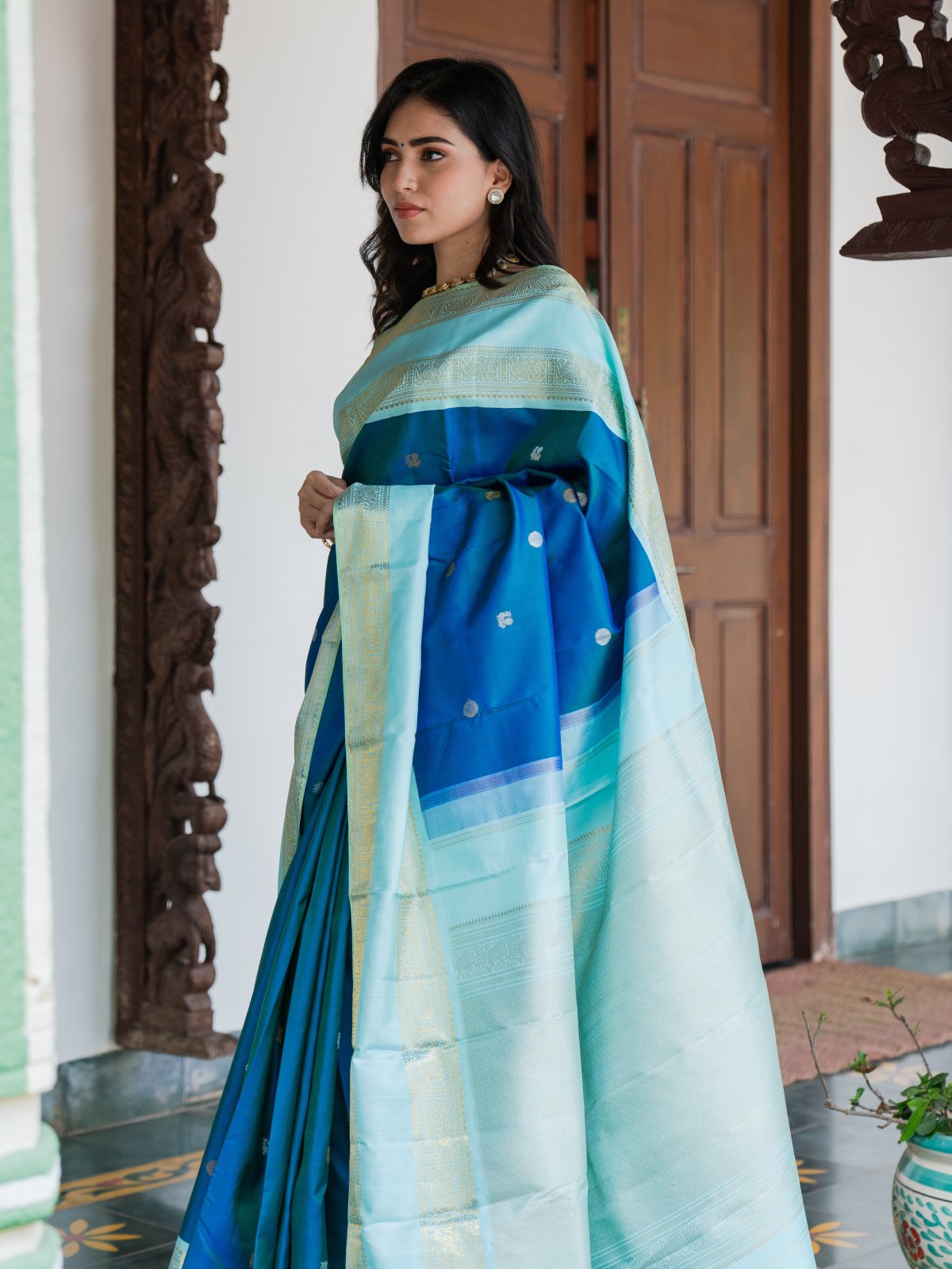 Peacock Blue Kanjeevaram Silk Saree With Light Blue Border