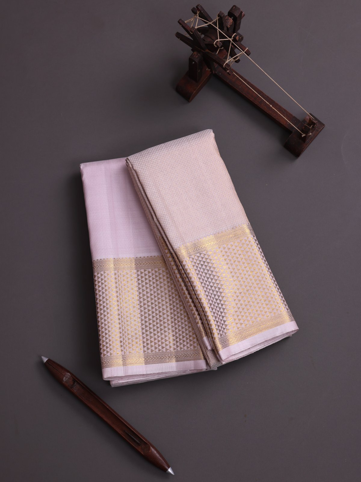 Light Pink Silk Dhoti And Zari Brocade Vasthram With Zari Border