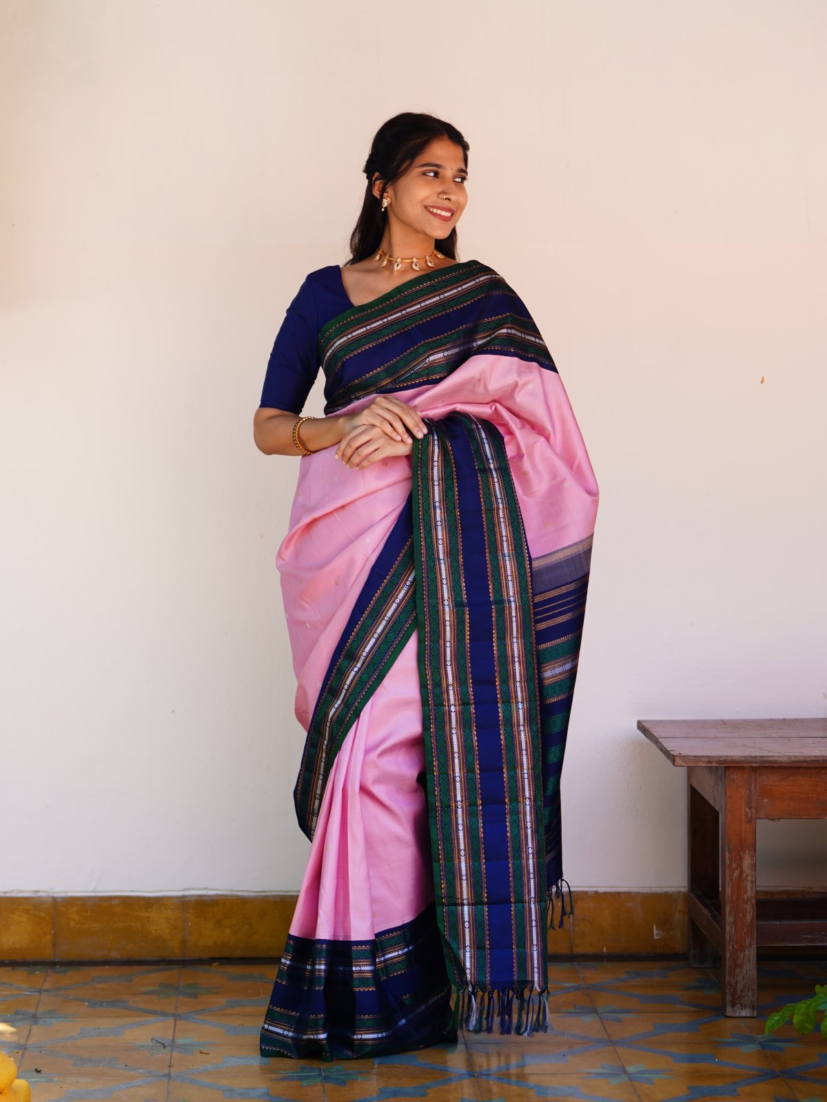 Light Pink Kanjeevaram Silk Saree with Navy Blue Zari Border