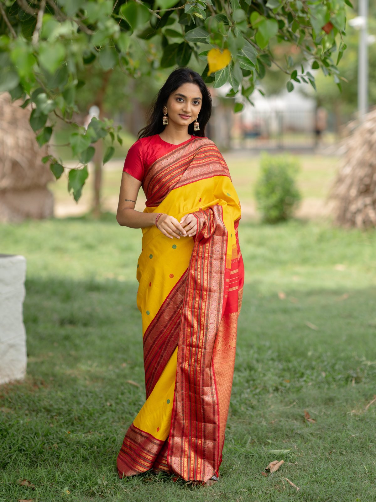 Yellow Kanjeevaram Silk Saree With Red Border