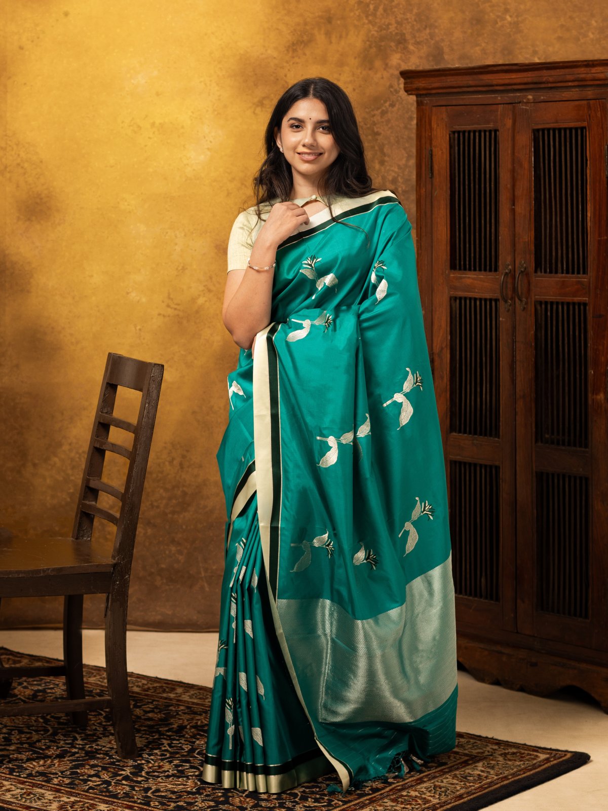 Teal Green Mashru Silk saree with Striped border