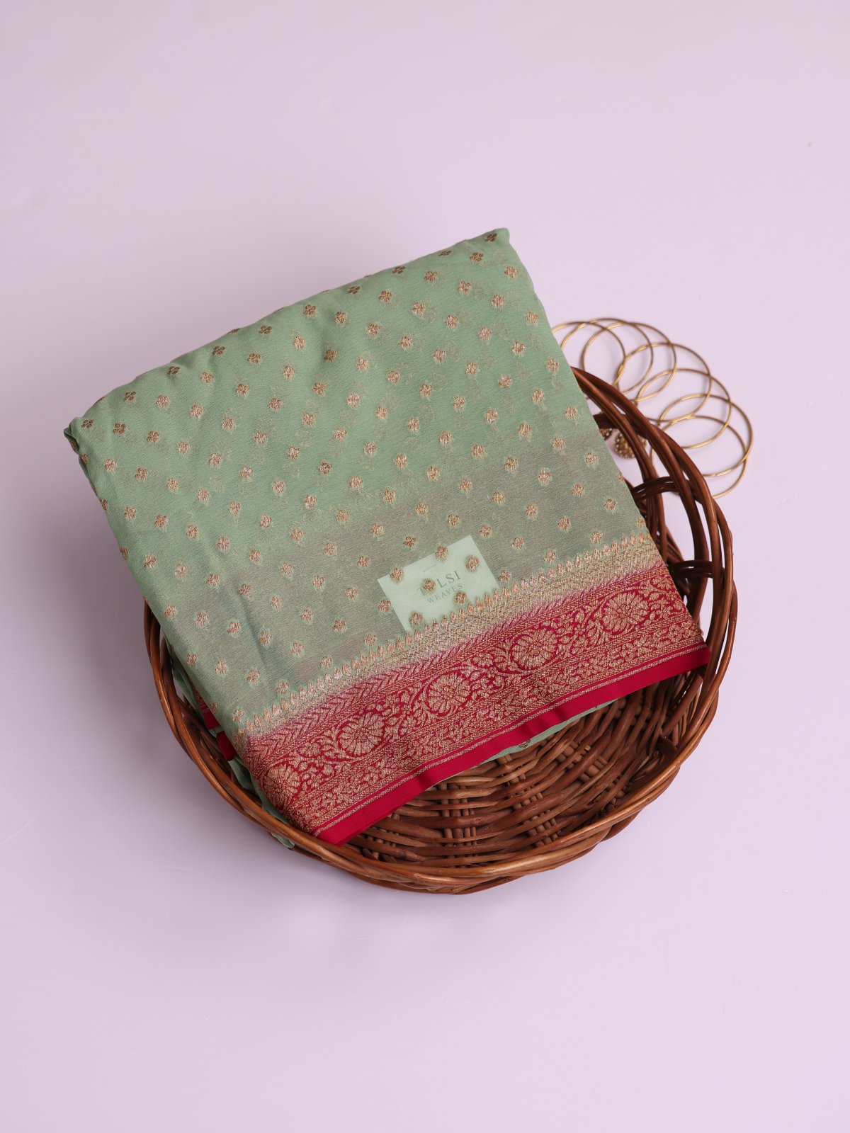 Pastel Green Banaras Georgette Silk Saree With Reddish Pink Border