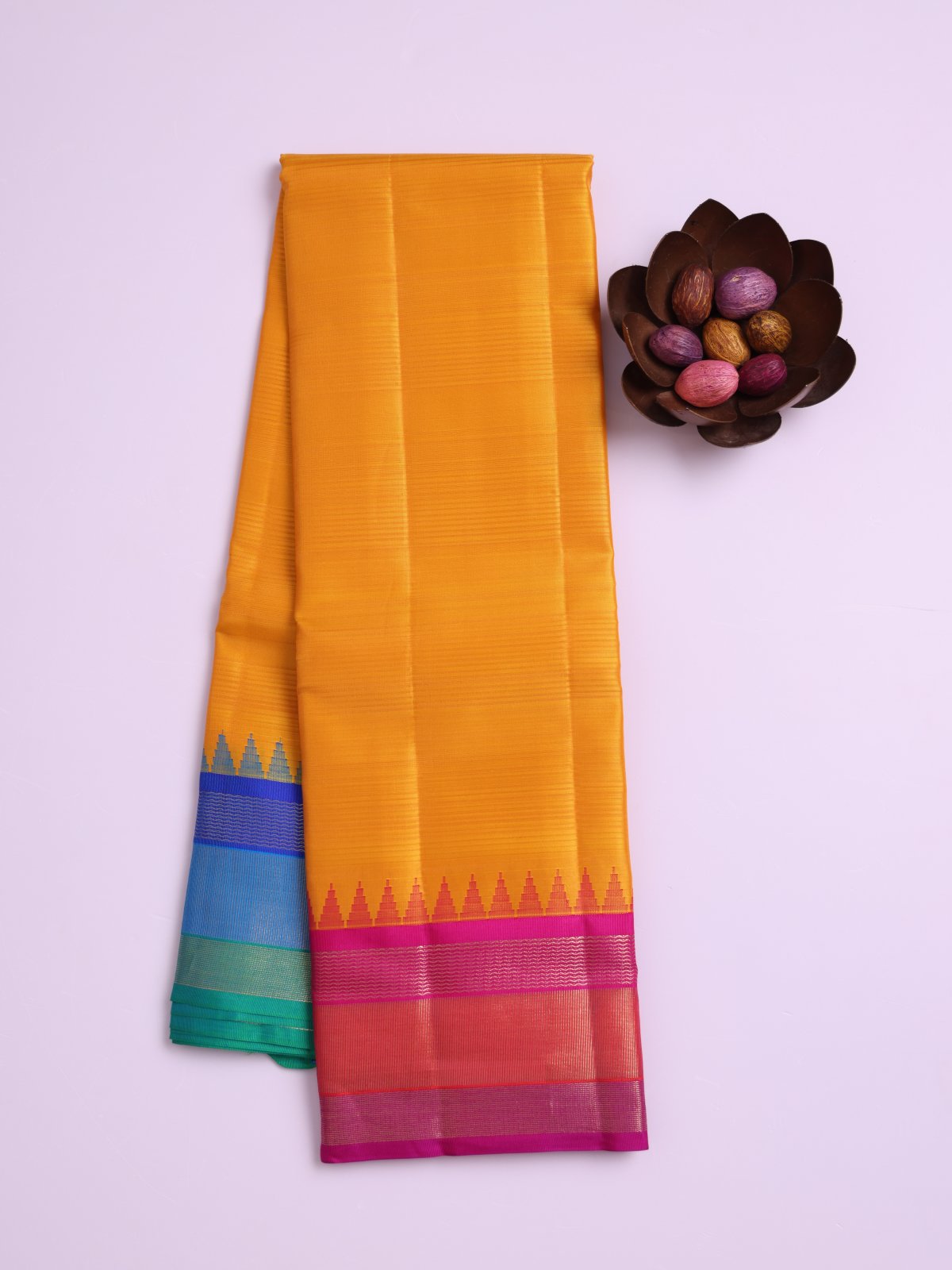 Mustard Yellow Soft Silk Saree with Rani Pink and Peacock Blue Ganga Jamuna Border