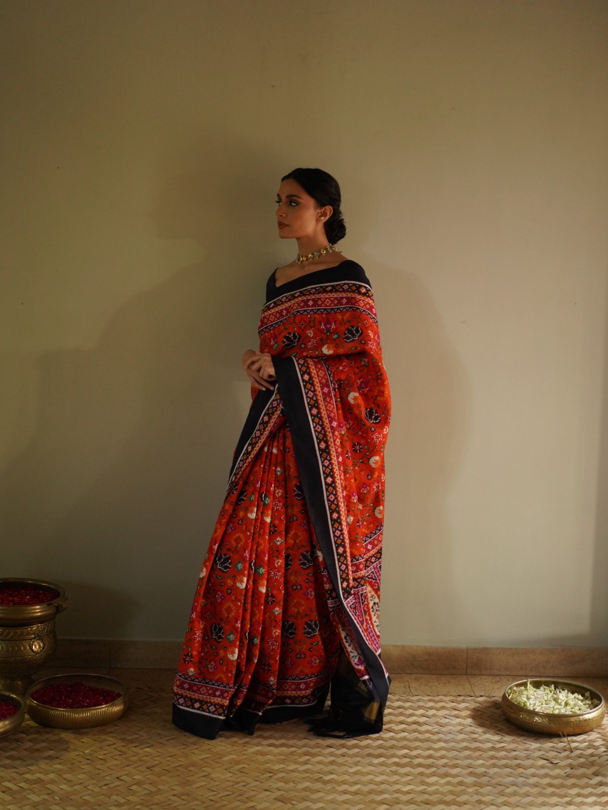Orange Patan Patola Silk Saree with Navy Blue Border