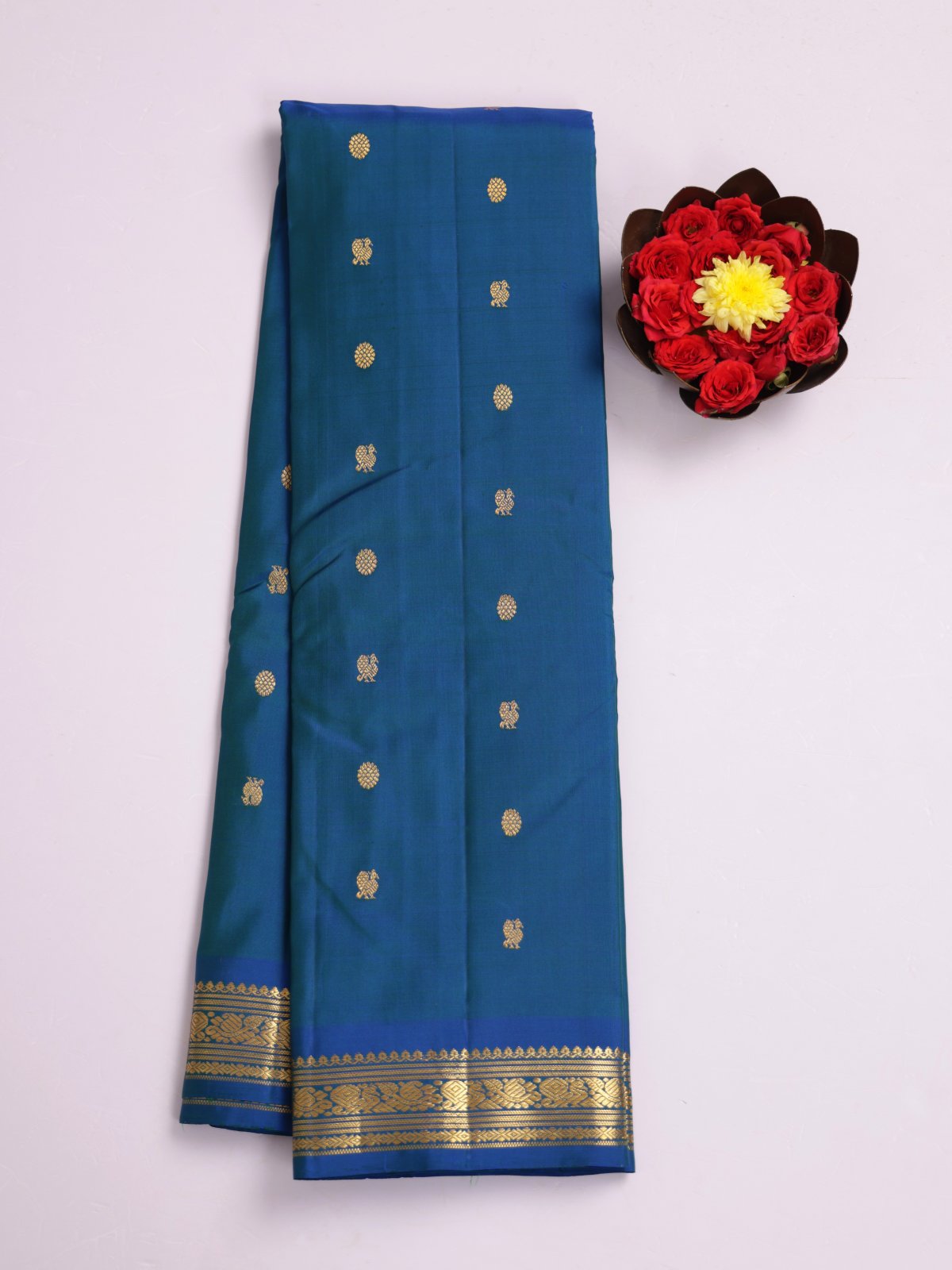 Peacock Blue Kanjeevaram Silk Saree With Blue Zari Border