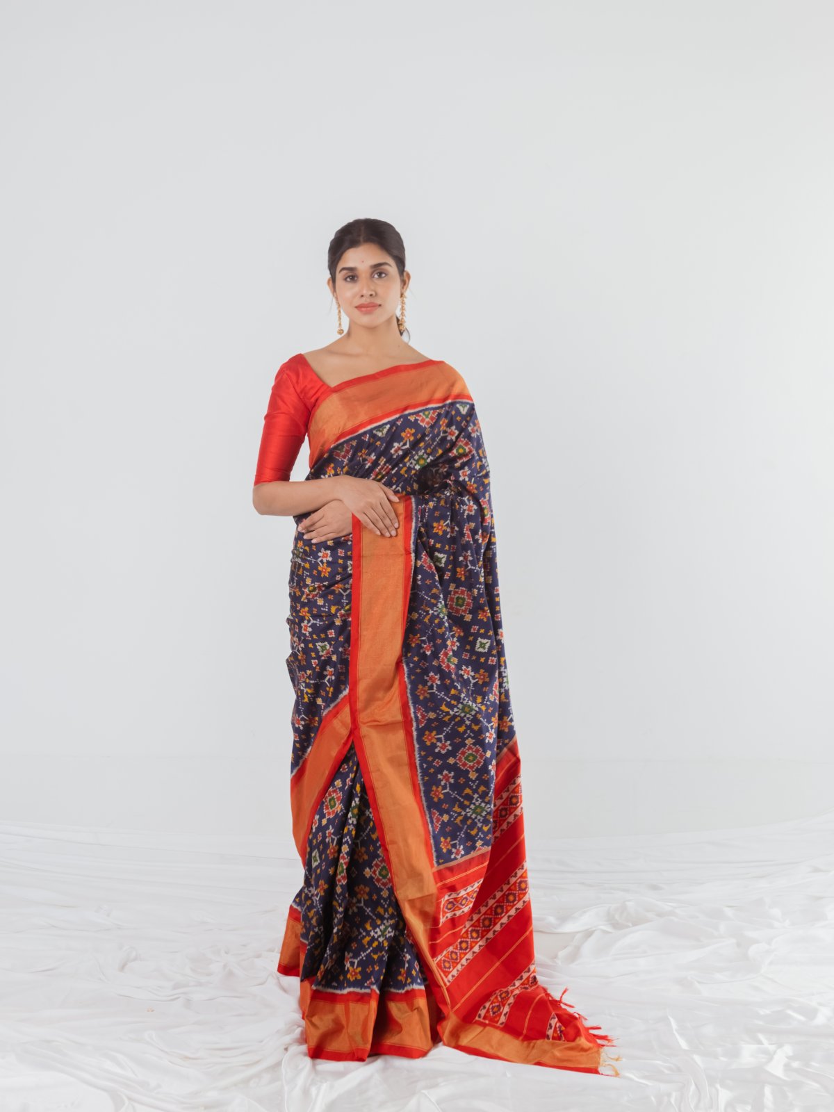 Navy Blue Ikat Silk Saree With Red Border