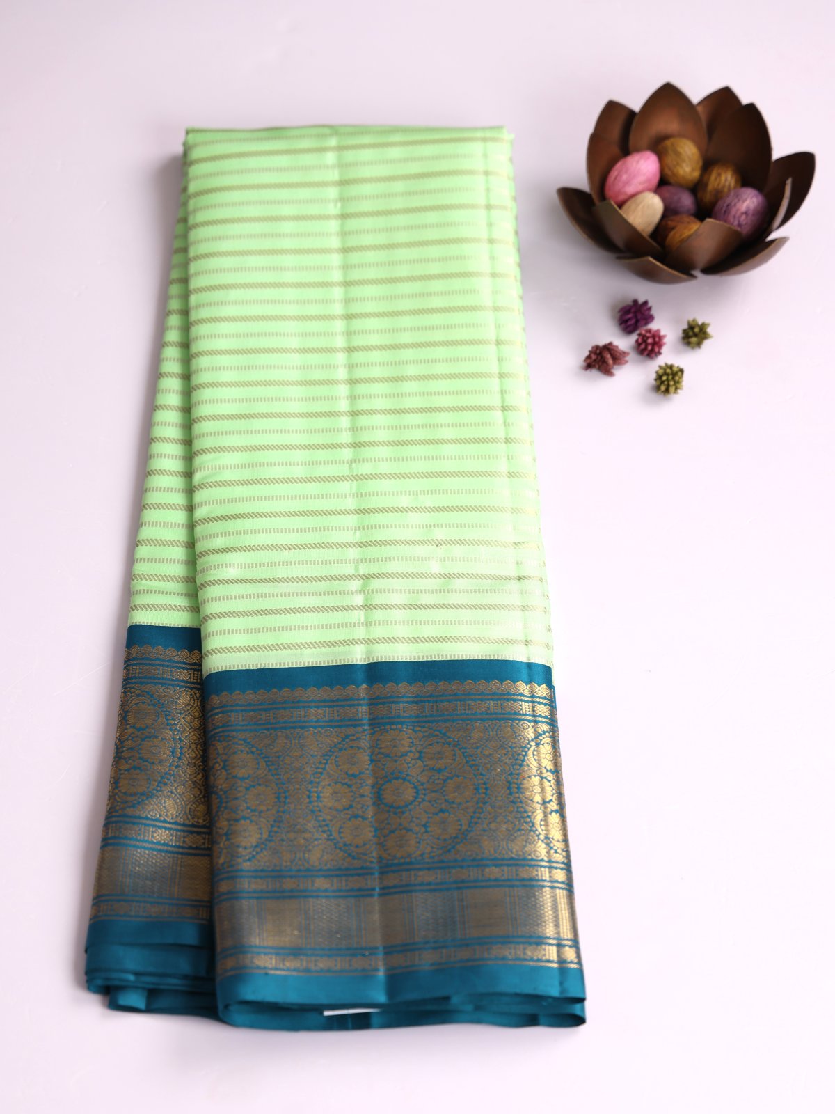 Mint Green Zari Striped Kanjeevaram Silk Saree With Peacock Blue Border