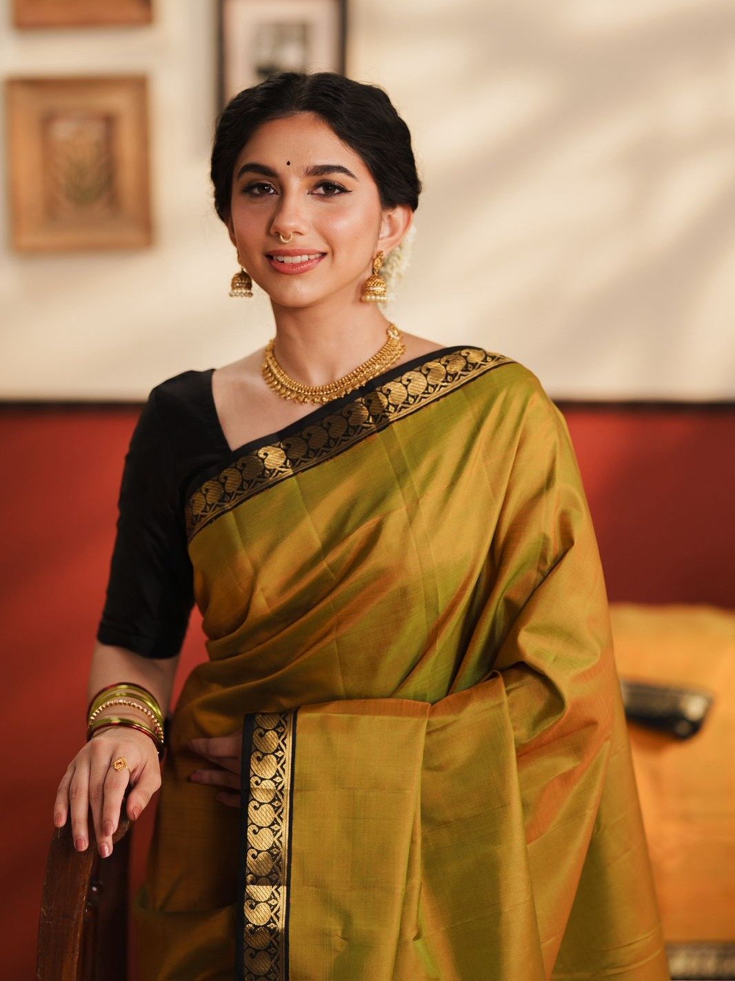Greenish Orange Kanjeevaram Silk Saree With Black Border