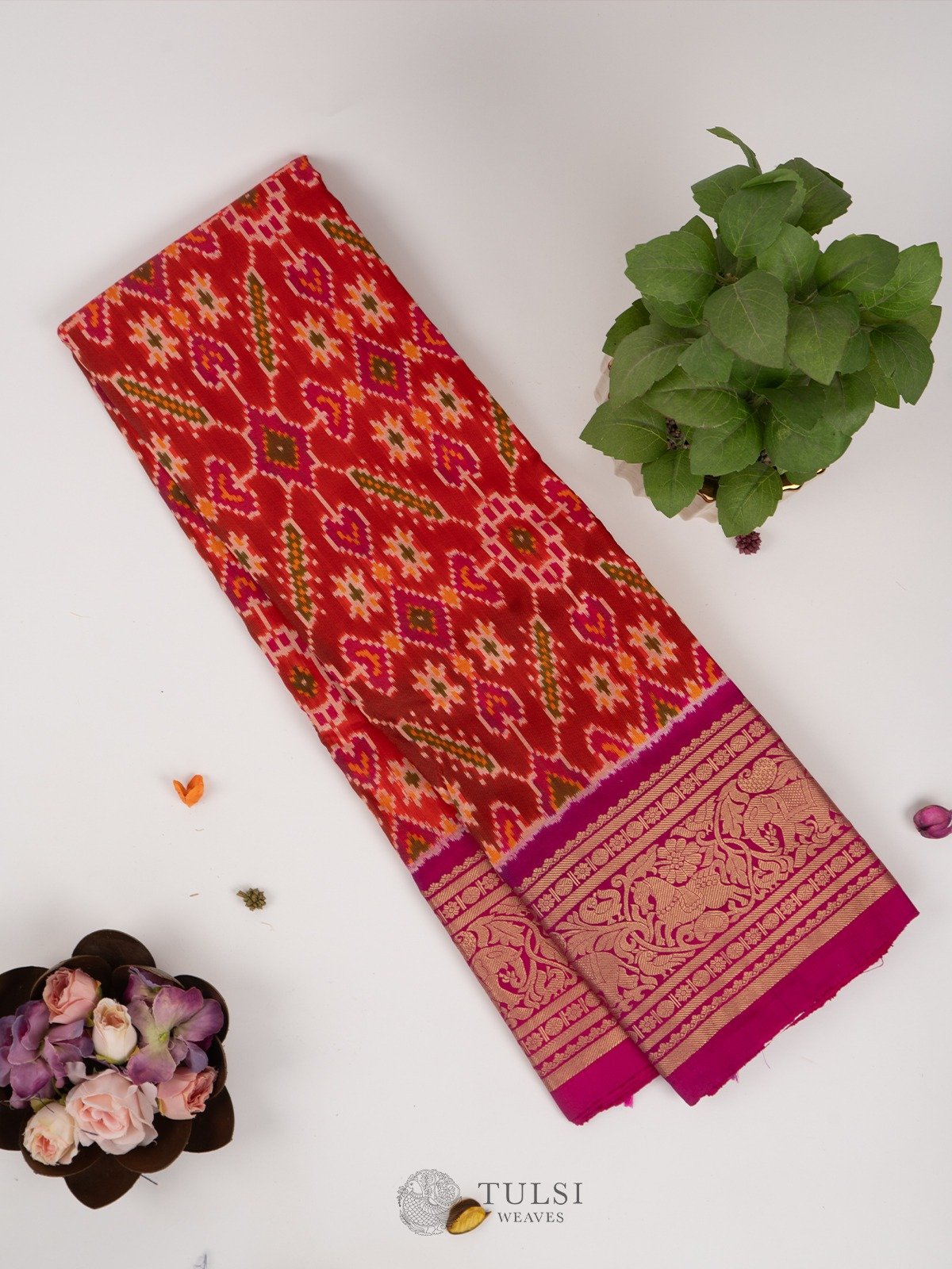 Orangish Pink Ikat Silk Saree with Zari border