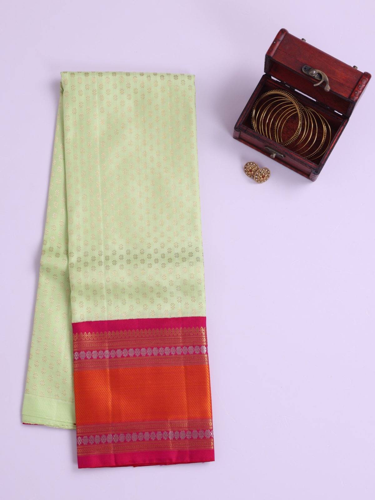 Light Green Kanjeevaram Silk Pavadai With Reddish Pink Border
