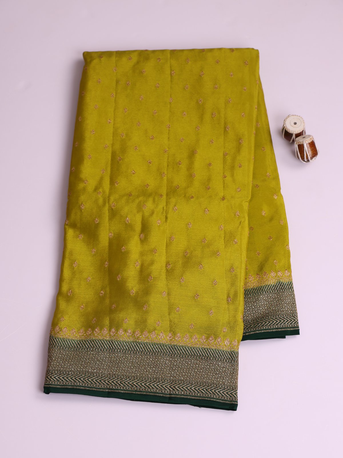 Yellowish Green Banaras Crepe Silk Saree With Bottle Green Border 