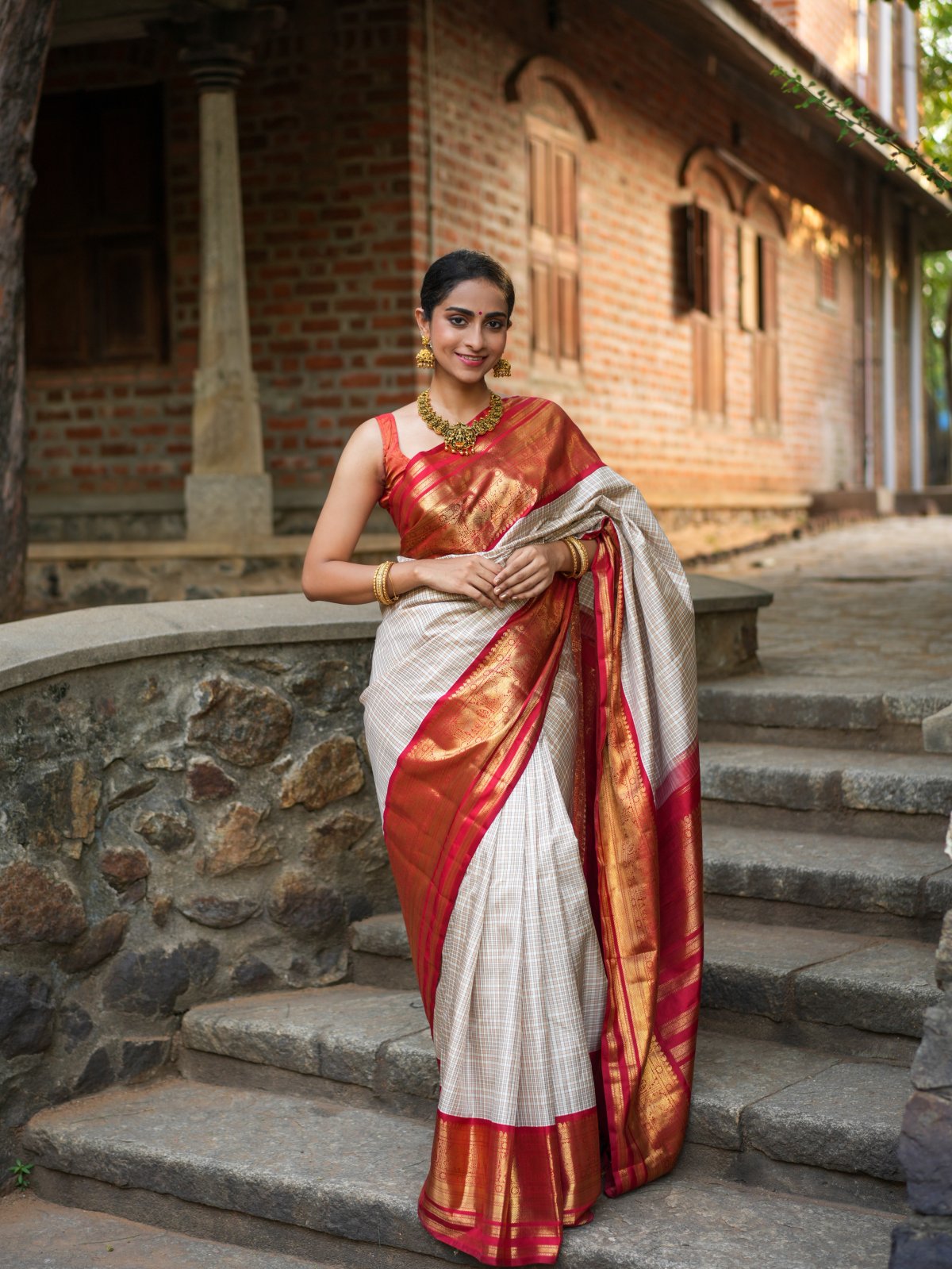 White Kanchipuram Silk Saree with Red Long Border