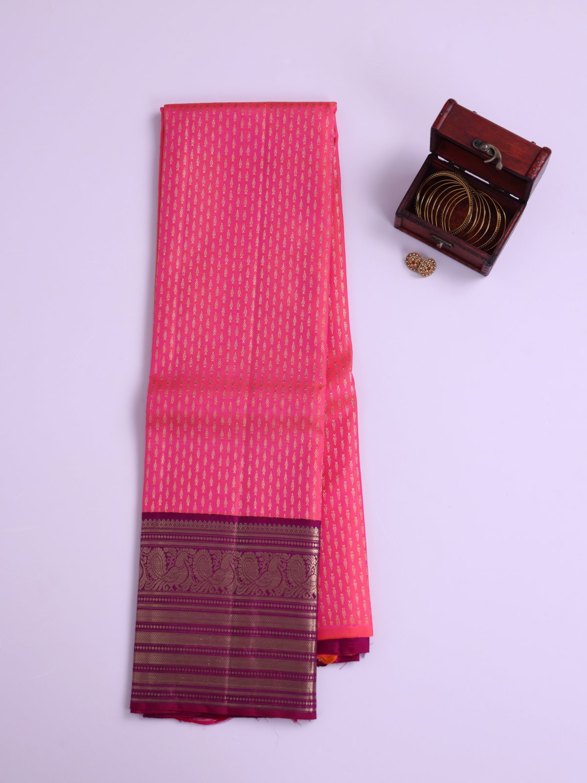Orangish Pink Kanjeevaram Silk Pavadai with Purple Border 