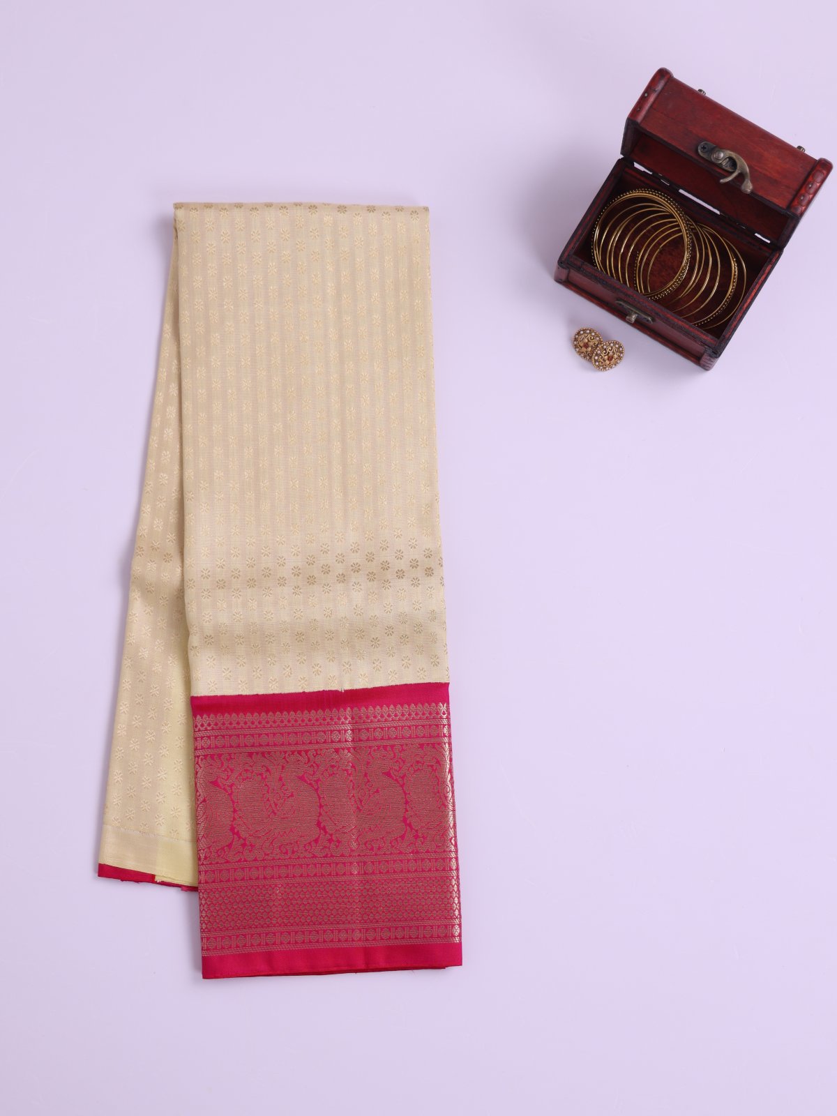 Off White Kanjeevaram Silk Pavadai With Reddish Pink Border 