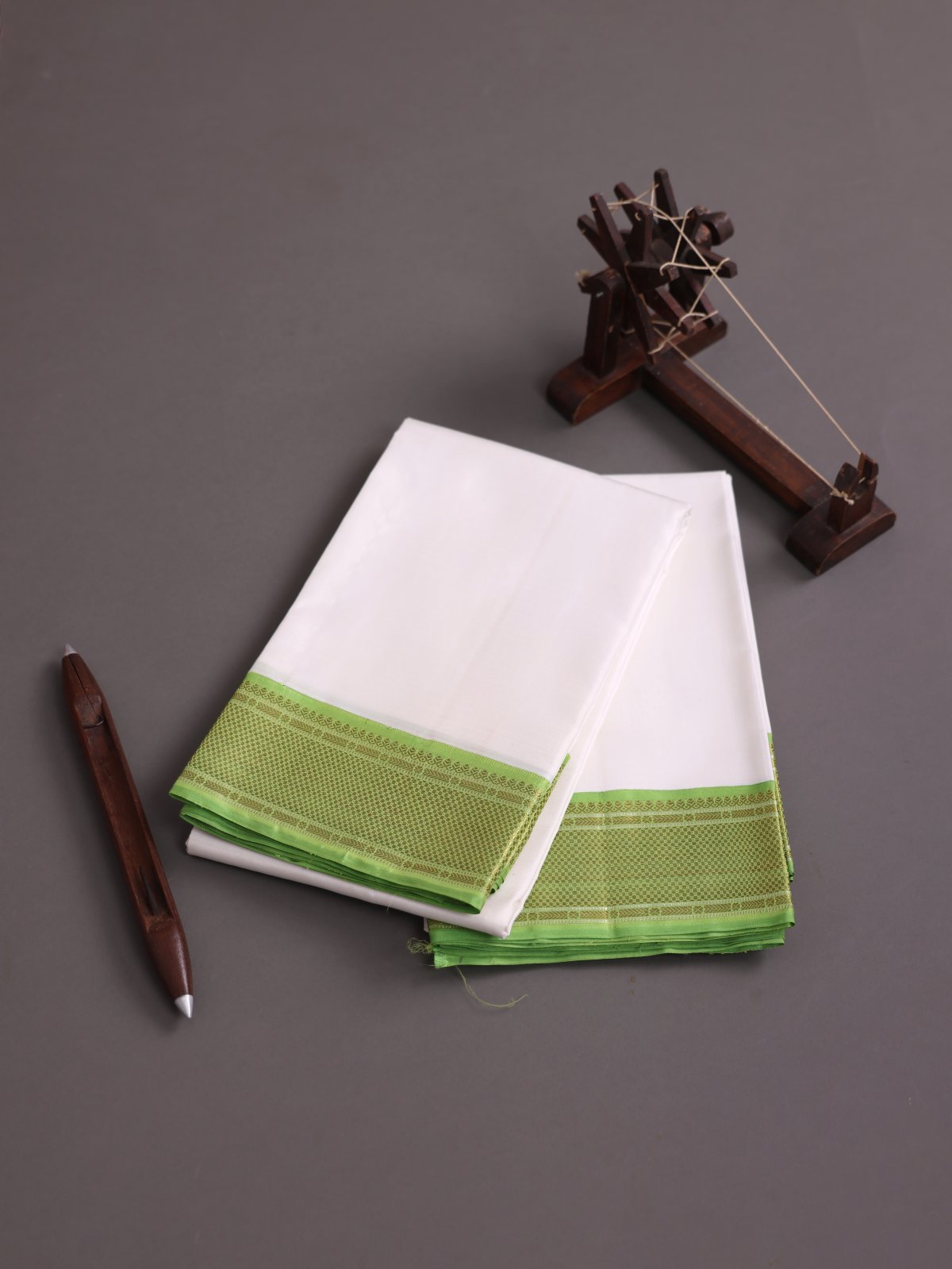 White Silk Dhoti And Vasthram With Parrot Green Zari Border