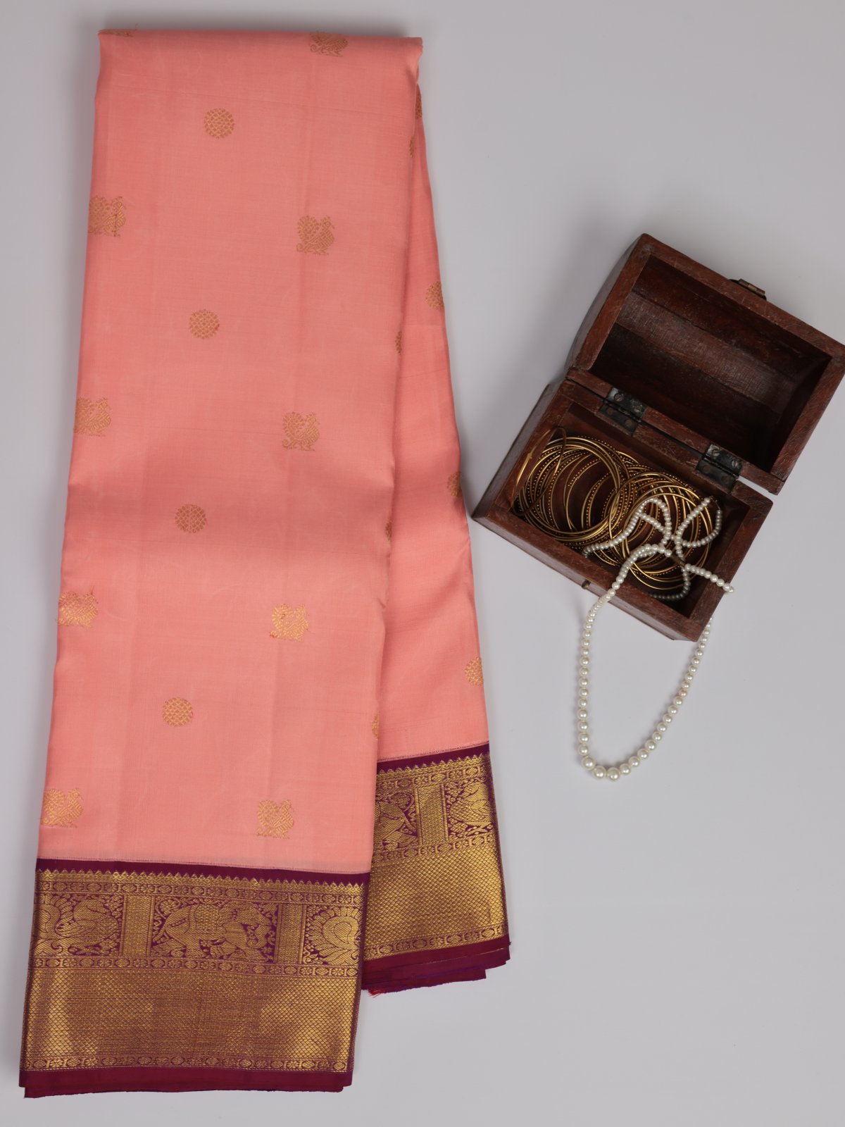 Peach Kanjeevaram Silk Saree With Burgundy Border