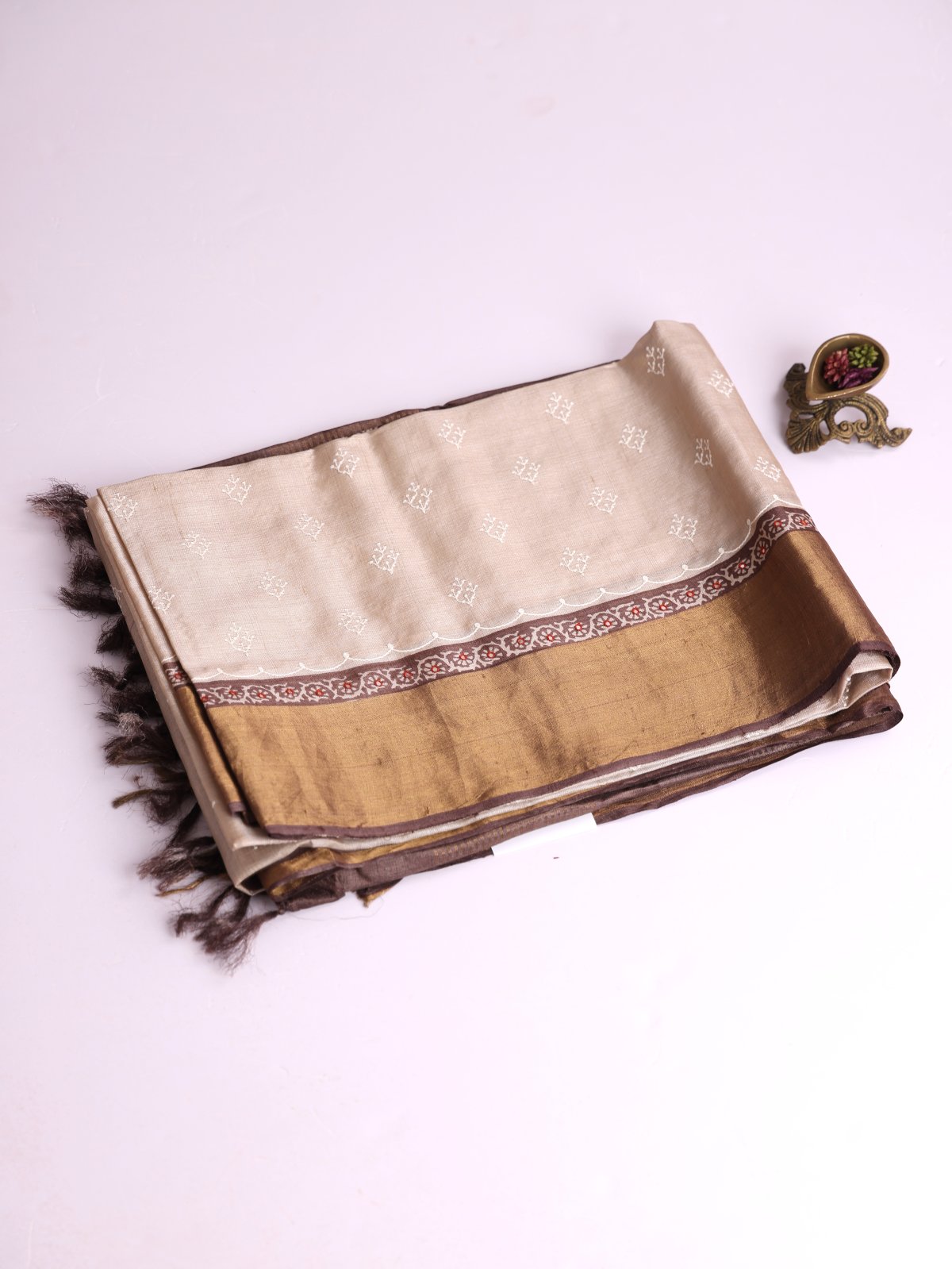 Beige Embroidered Tussar Silk Saree With Brown Zari Border