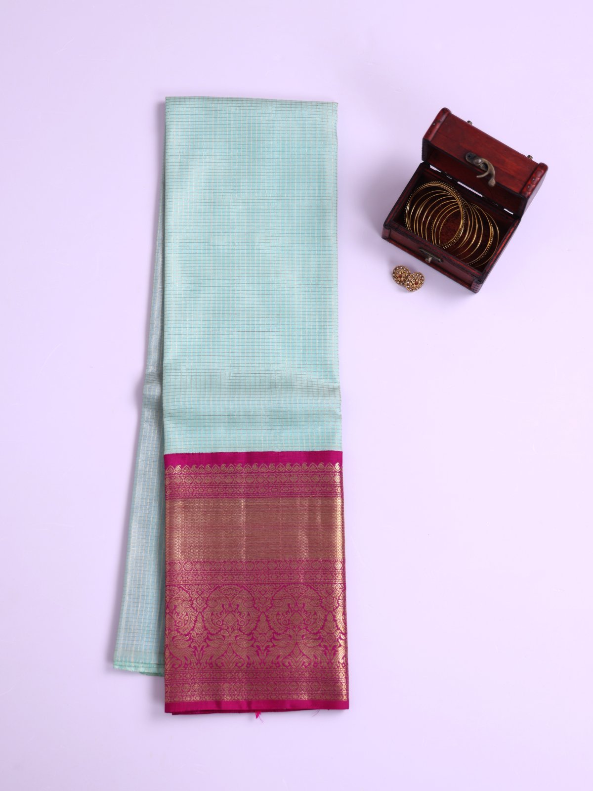 Light Greenish Blue Kanjeevaram Silk Pavadai With Magenta Border