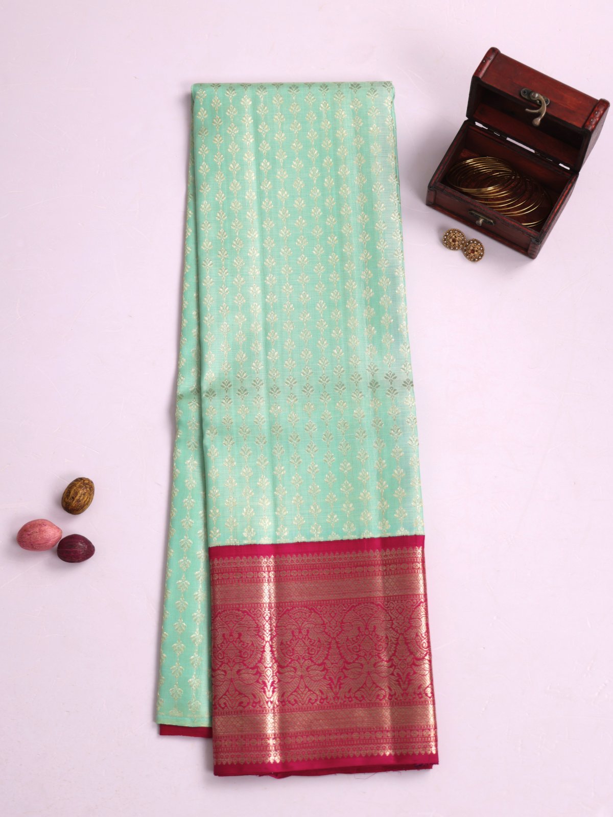 Light Green Kanjeevaram Silk Pavadai With Rani Pink Border