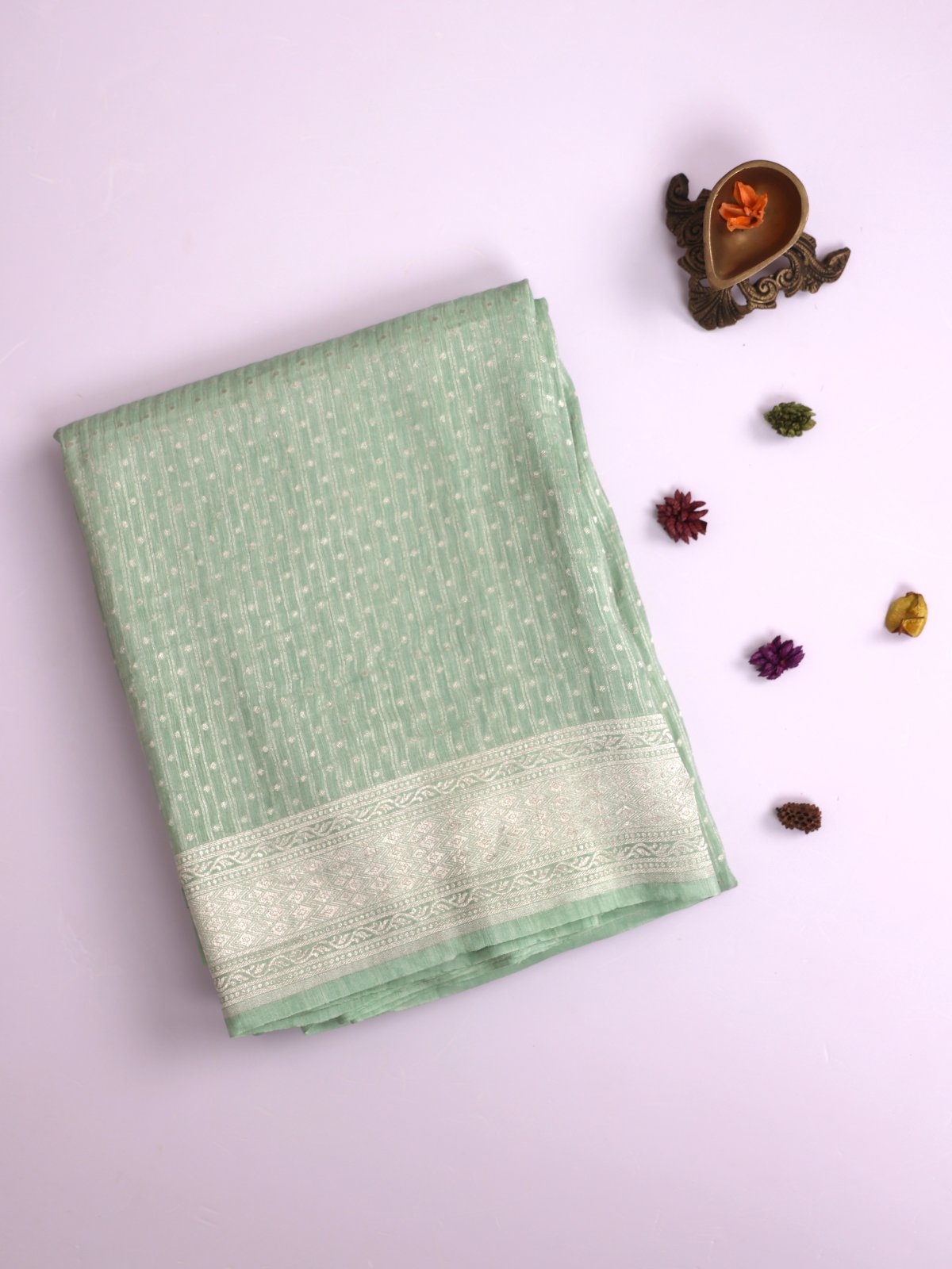 Pastel Green Linen Saree With Zari Border