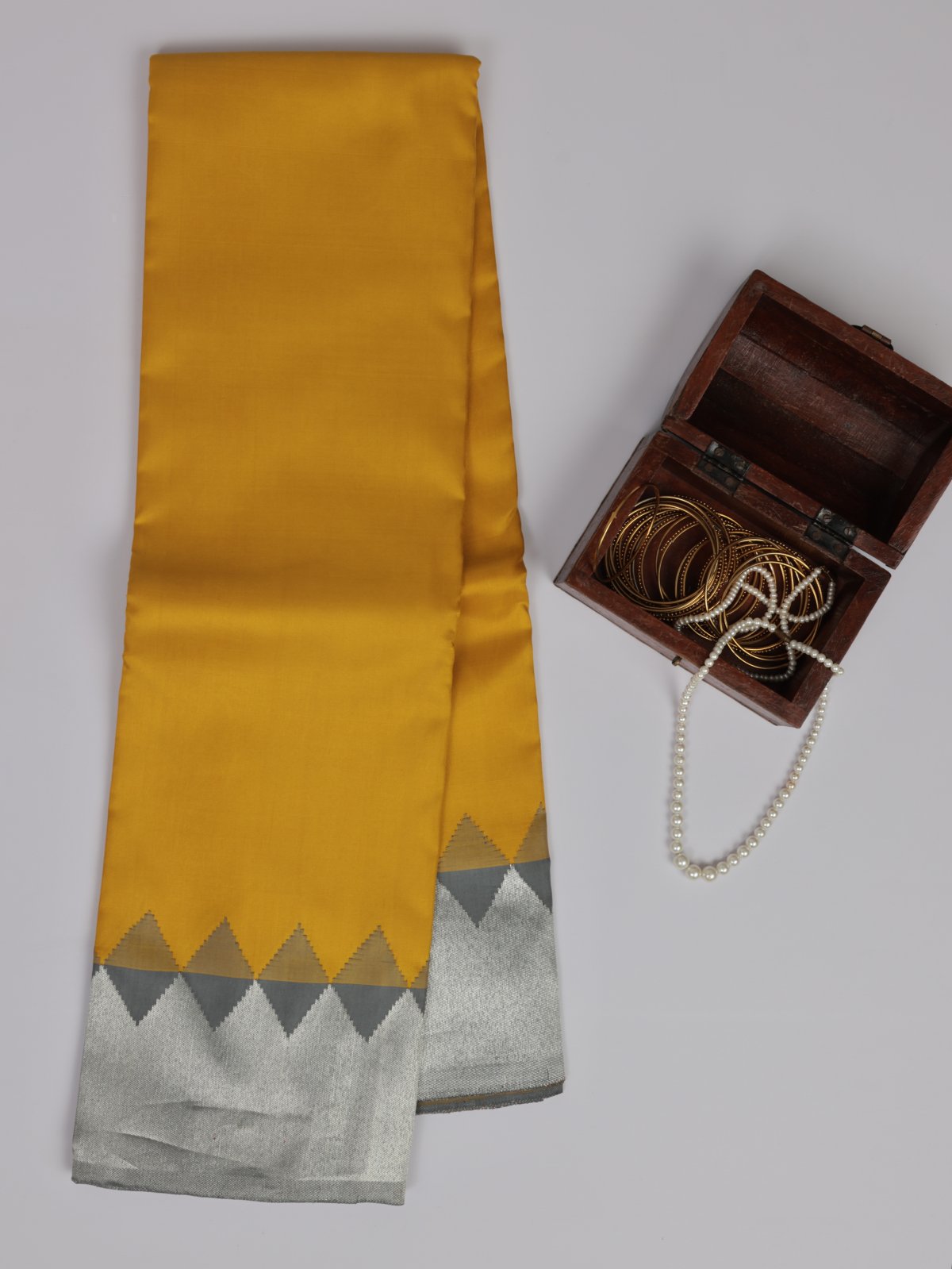 Yellow Kanjeevaram Silk Saree With Grey Ettukol Border