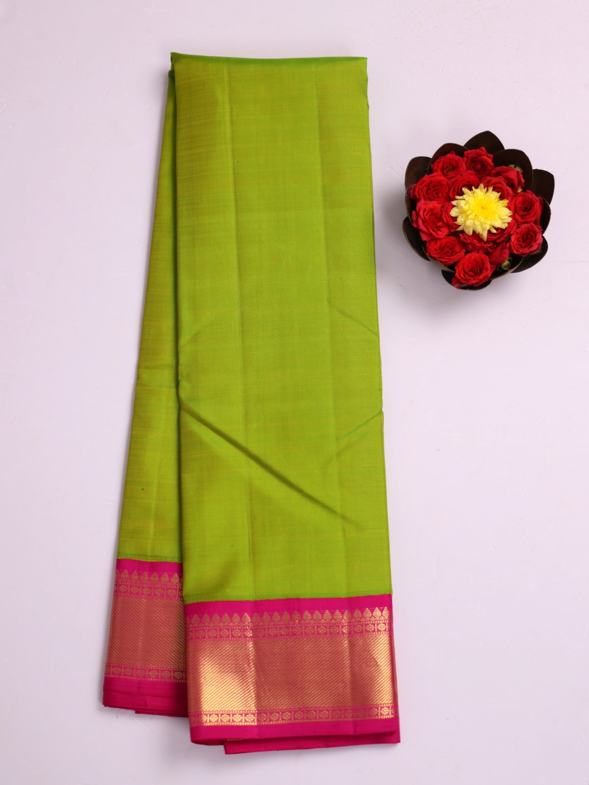 Parrot Green Kanjeevaram Silk Saree With Rani Pink Zari Border
