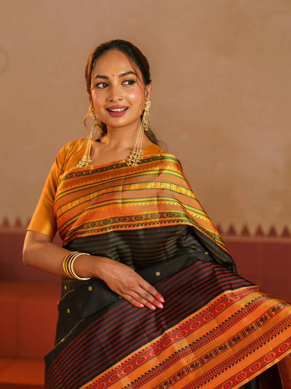 Crafted 18 - Black Kanjeevaram Silk Saree With Yellowish Orange Border