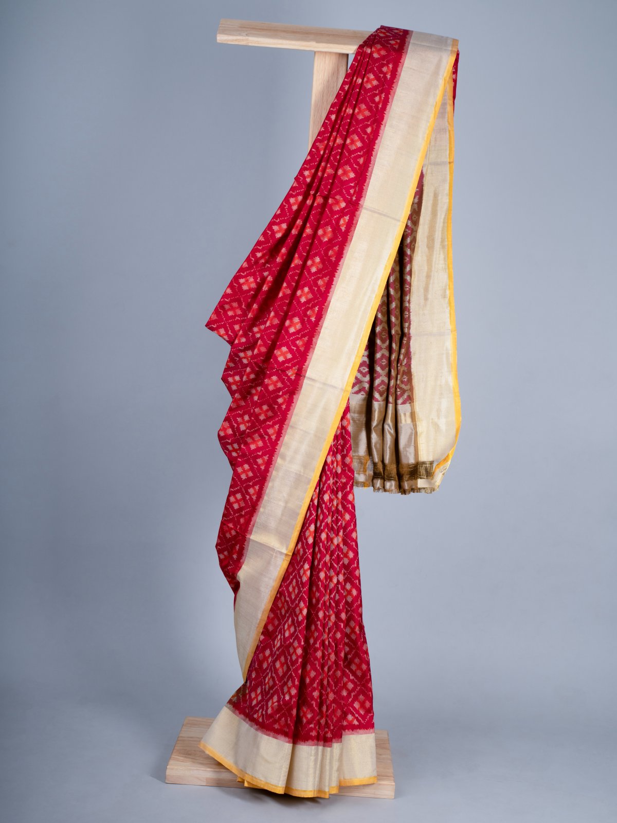 Reddish Pink IKat Silk Saree With Off-White Border