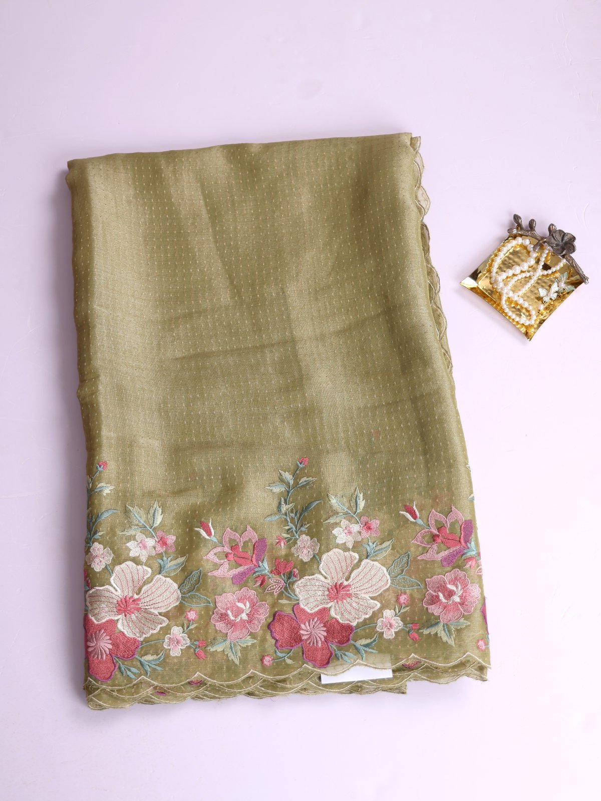 Pastel Green Tissue Georgette Silk Saree With Embroidered Border