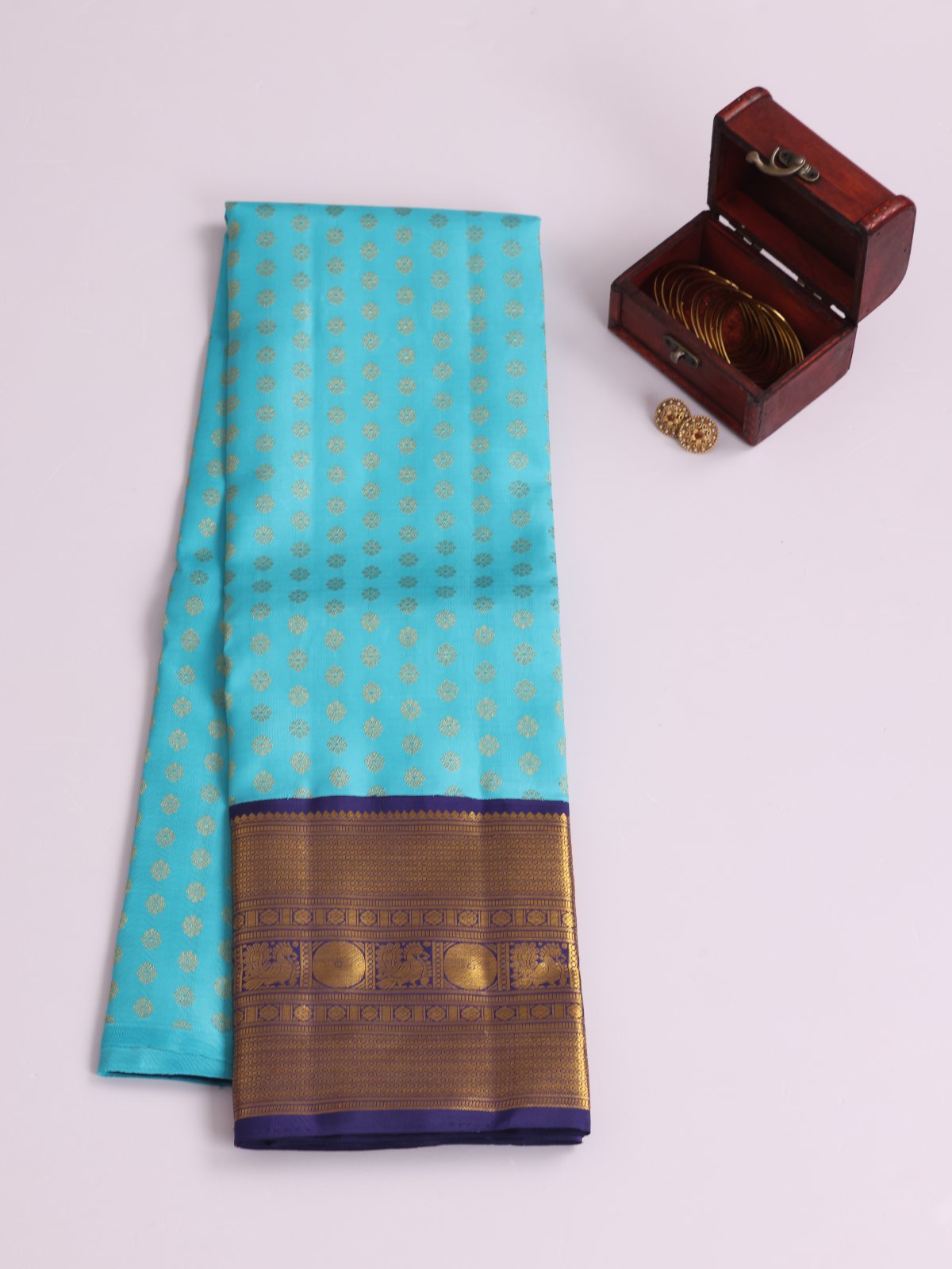 Light Blue Kanjeevaram Silk Pavadai With Navy Blue Border