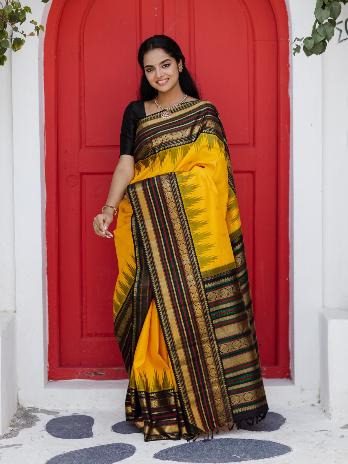 Yellow Kanjeevaram Silk Saree With Black Border