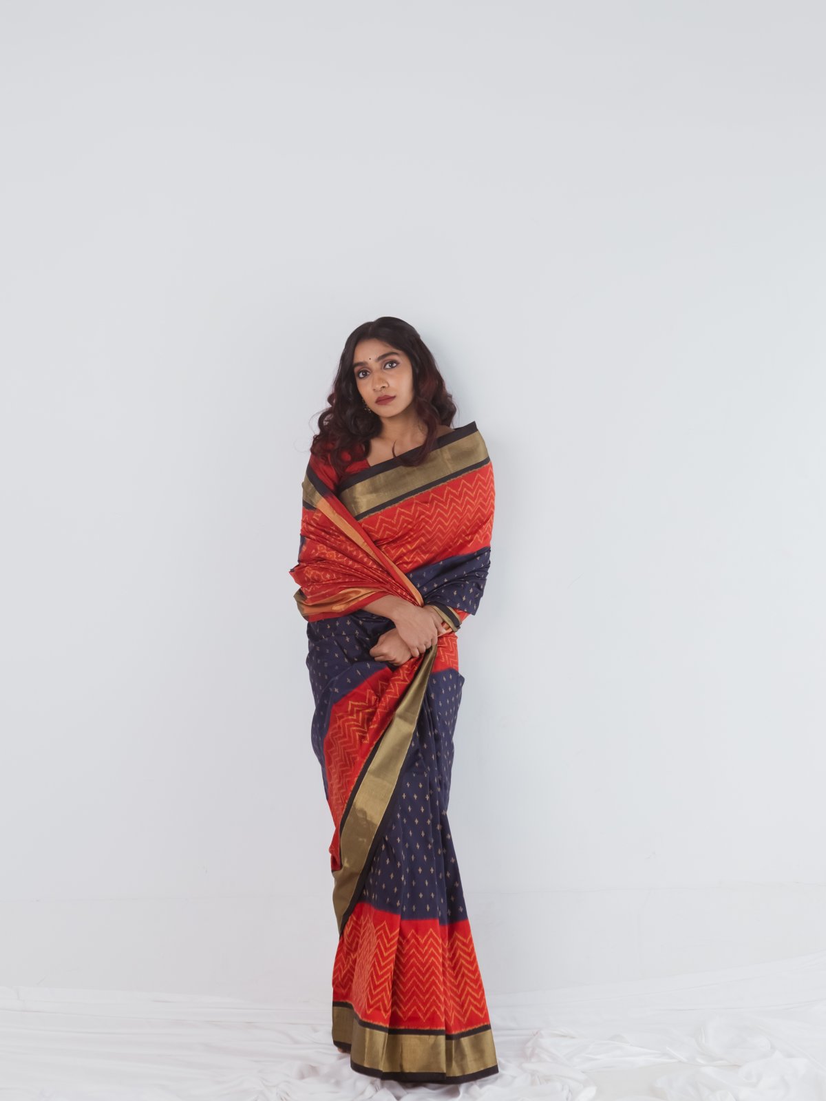 Navy Blue Ikat Silk Saree With Vermillion Red and Black Border
