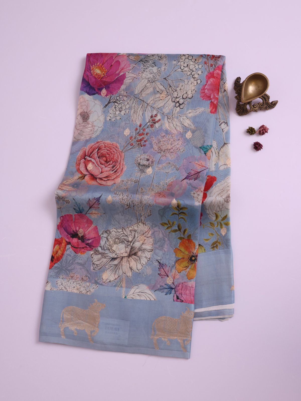 Powder Blue Printed Organza Silk Saree with Self Satin Border