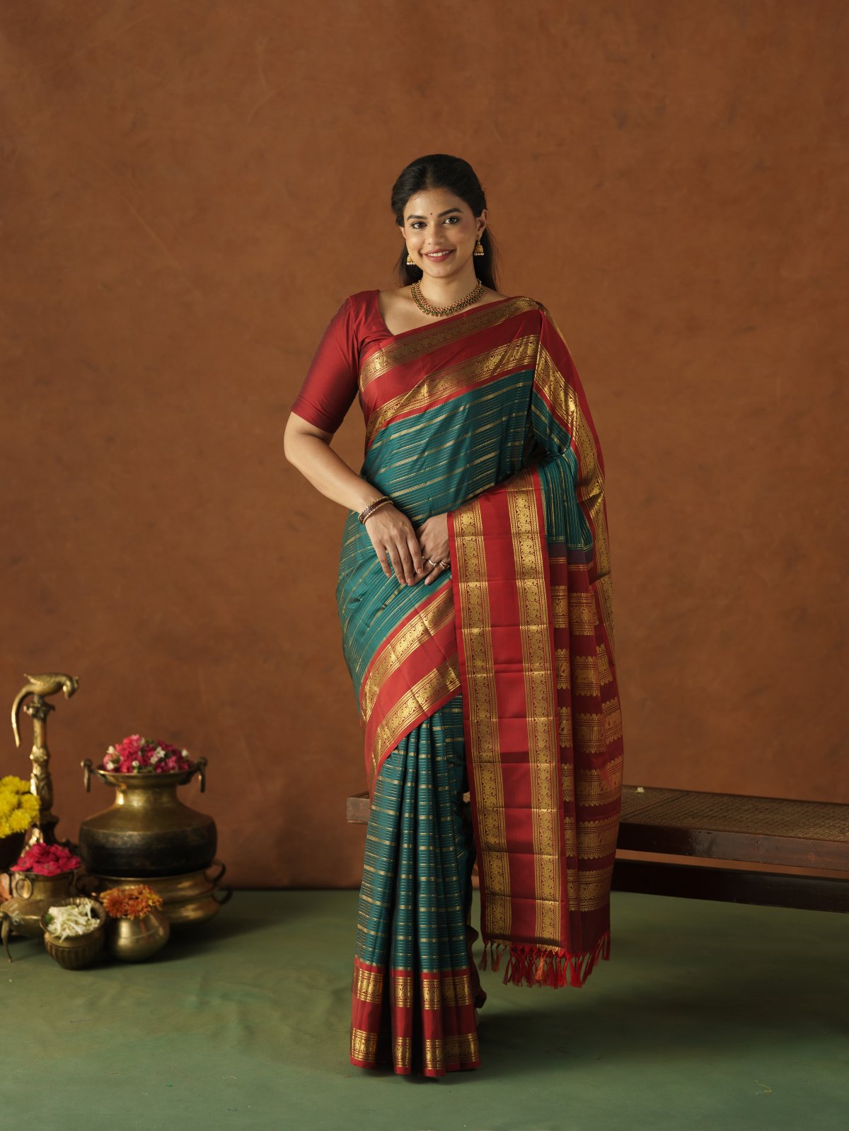Teal Green Kanjeevaram Silk Saree with Red Border